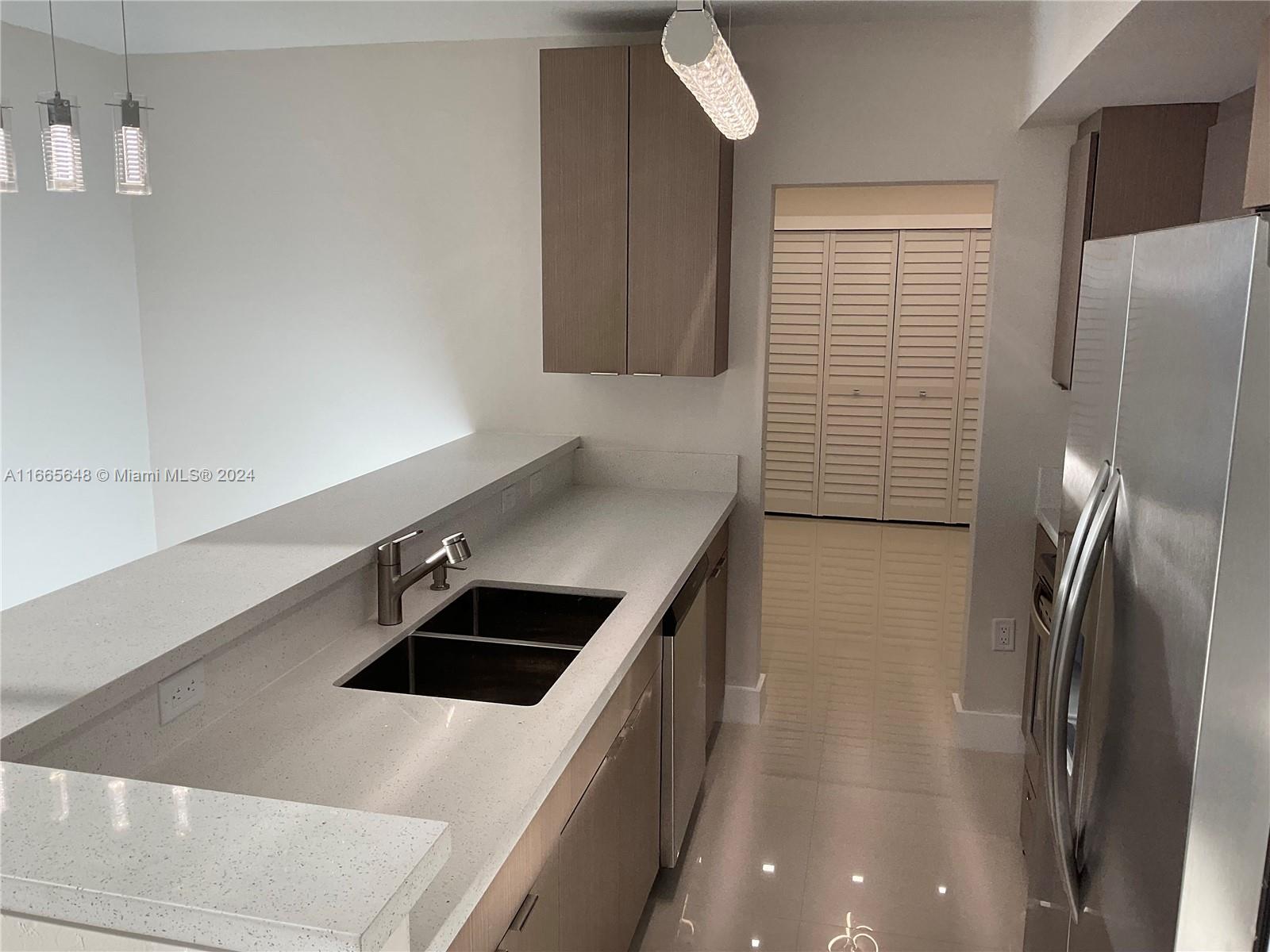 Completely renovated unit in an oceanfront building in Bal Harbor. 1 bedroom + den that can easily be used as a 2nd bedroom w/ 2 full bath. The unit was remodeled from top to bottom with all fine luxury finishes, which include a made to order designer kitchen cabinetry with fashionable stone countertops, stainless steel appliances, Moet faucets. The master bed has a master bath fitted with a Toto toilet/bidet and oversized shower which includes state of the art fixtures. The 2nd bathroom has a tub. Gorgeous porcelain floors. Expensive light fixtures. This line has largest balcony. There are so many lovely features, but nothing compares to the breathtaking lovely sunset views. OWNER FINANCING AVAILABLE! Seller will pay Buyer Realtor. Don't miss this opportunity to sell...