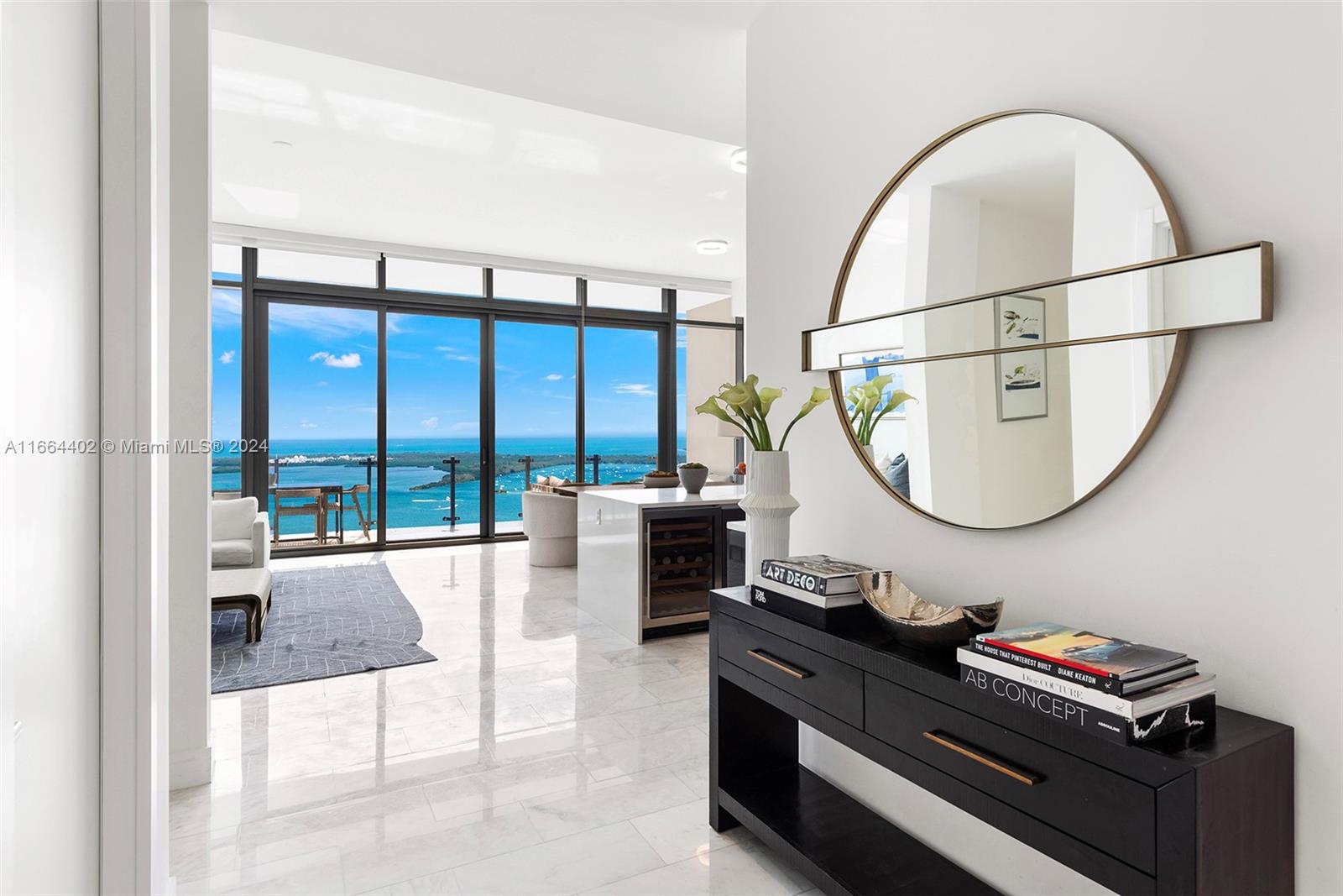 Welcome to this exquisite lower PH at Echo Brickell, a residence that epitomizes sophistication and exclusivity. This home offers 3 bedrooms, 3.5 bathrooms, plus den, all complemented by oversized terraces. Enjoy breathtaking panoramic views of the city and bay, floor-to-ceiling windows that flood the space with natural light. The kitchen features Wolf & Subzero appliances and a fully outfitted summer kitchen with a BBQ. Echo stands as an iconic beacon of luxury, with only 172 residences enjoying world-class amenities. Unwind at the stunning infinity pool deck with F&B service, rejuvenate in the private health club, or relax in the exclusive residents' lounge. A dedicated 24/7 concierge and security team on site, all within steps of Brickell’s premier shopping and dining destinations.