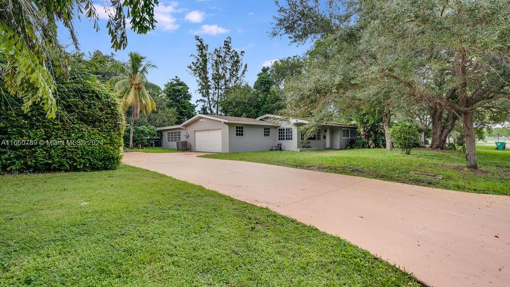 Step back in time with this charming nestled home in the heart of Pinecrest. Featuring original details and ample land, this property offers a unique opportunity. With its prime location and endless potential, this home is a true gem for anyone with a vision. Total square footage under A/C including in-laws-quarter is 1750sqft. Surrounded by top-rated schools this property is perfect for a family. Some photos are virtually staged.