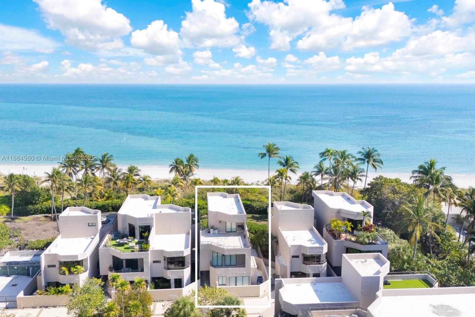 Exceptionally rare beachfront, standalone, townhouse in Key Colony, Key Biscayne. One of the few Miami-Dade properties with direct beach access. Spanning over 3,200 sqft, this 4-bed, 6-bath gem offers an unparalleled island lifestyle. Highlights include a private ground-floor cabana with new AC, impact windows & doors, a private elevator for easy access across its four levels, & Subzero paneled refrigerators. The rooftop terrace, complete with an outdoor wet bar, is perfect for enjoying sunset. With 6 parking spaces, including 2 in a private garage, providing added privacy & security. Located in the prestigious Key Colony, enjoy resort-style lifestyle with multiple pools, 12 tennis courts, a fitness center, & a spa. On-site amenities include a gourmet market, beach bar, & 24-hour security.