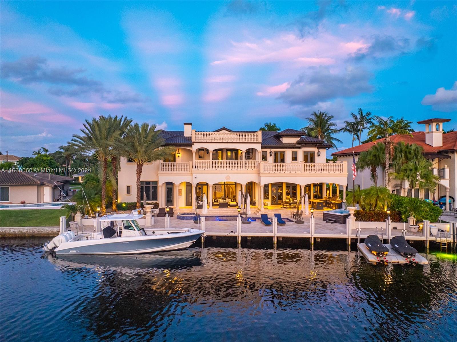 Welcome to paradise! This stunning estate offers luxurious living with 108+/-ft. of prime water frontage on arguably the best street in Lighthouse Point. It features elegant architectural details, spacious interiors, and upscale finishes throughout. The property boasts breathtaking waterfront views, lush landscaping, and outdoor amenities like a pool, spa and private dock, ideal for boating enthusiasts. Comprised of 5 suites, theater room, custom chef's kitchen with top of the line appliances, air conditioned garages, beautiful summer kitchen and a rooftop patio. Located in a prestigious neighborhood, this estate combines beauty and exclusivity, perfect for those seeking a refined waterfront lifestyle. It doesn't get much better than this!