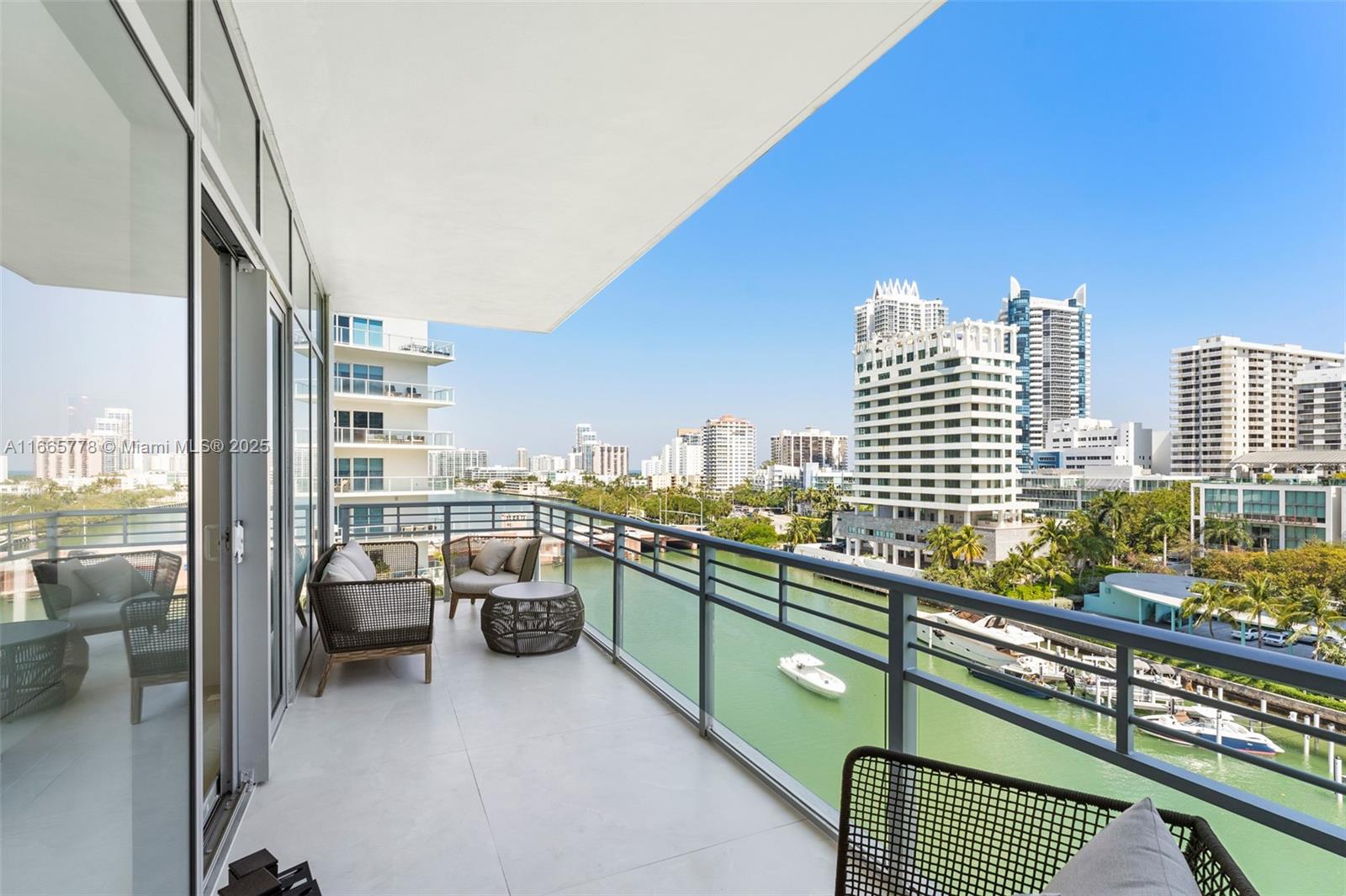 Experience luxury living in this exclusive, guard-gated boutique condo on Aqua Allison Island in mid-Miami Beach. Designed by a renowned architect, this 3-bed, 3.5-bath residence offers an expansive terrace with stunning water views and high ceilings. The main suite features terrace access and a luxurious marble bathroom with dual sinks, a steam shower, and a bathtub. Perfect for entertaining, the upgraded kitchen boasts high-end appliances. Other features include new porcelain floors, electric shades, and blackout shades in all bedrooms. Enjoy superb amenities such as 24-hour security, 2 pools, a gym, a spa, BBQ areas, and easy access to beaches, top dining, and shopping.