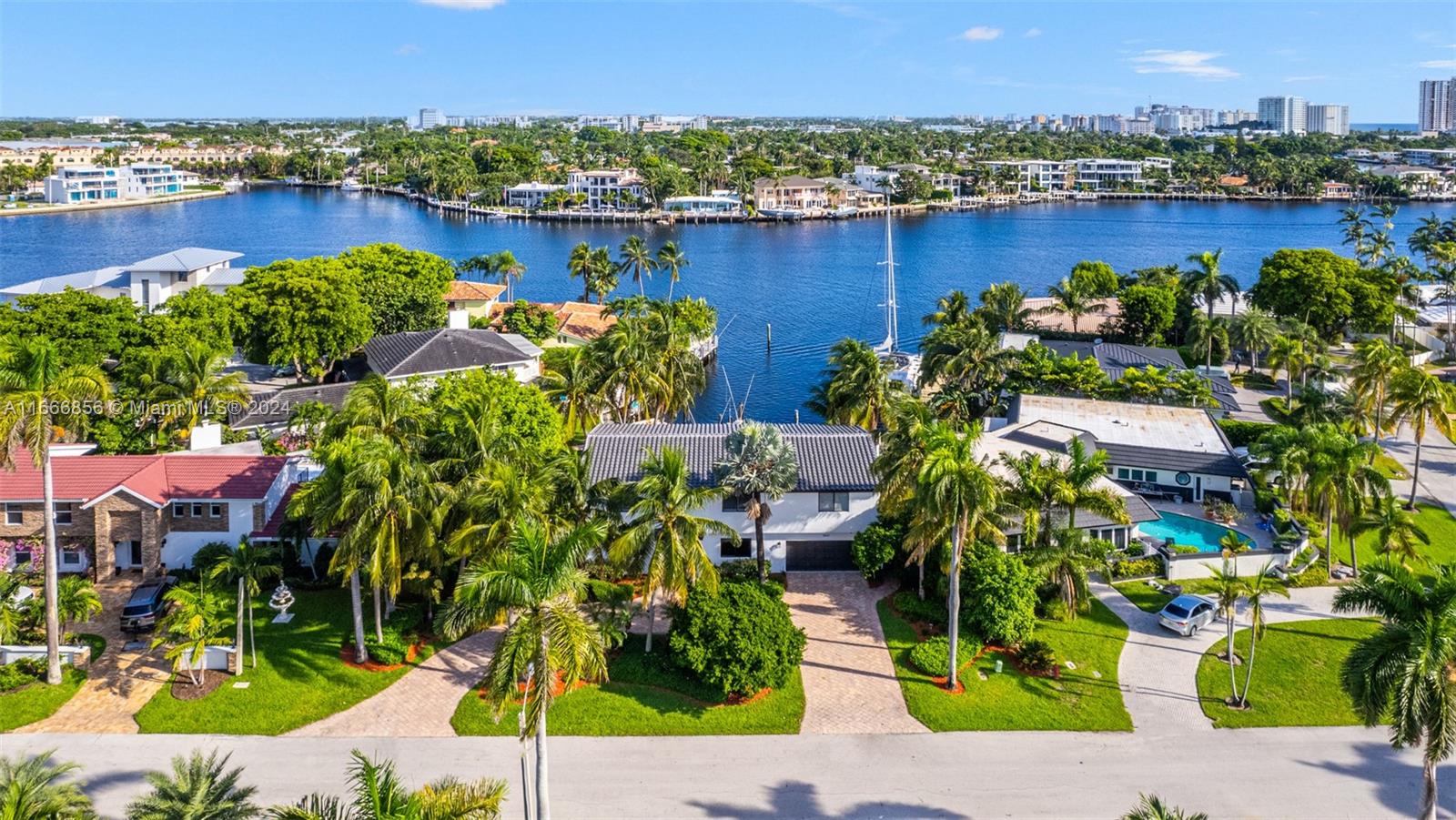 This Rare Waterfront Gem includes 6 LARGE BEDROOMS and 4 Full Baths totaling over 4,400 sq ft. with direct intracoastal and ocean access!!  It even includes an additional 7th room which would be perfect for an office.  Beautifully remodeled with a Brand new roof, Brand new pool, impact windows, new paint, new floors, new landscaping, an outdoor kitchen, and the list goes on!  A giant backyard which is perfect for entertaining and beautiful views from nearly every room of the house!  Just in case of a storm you have a whole home generator which can be powered for weeks!  Over 50 feet of water frontage and an extended finger shaped dock giving you direct and easy dockage.  Making this is a Boaters Paradise!