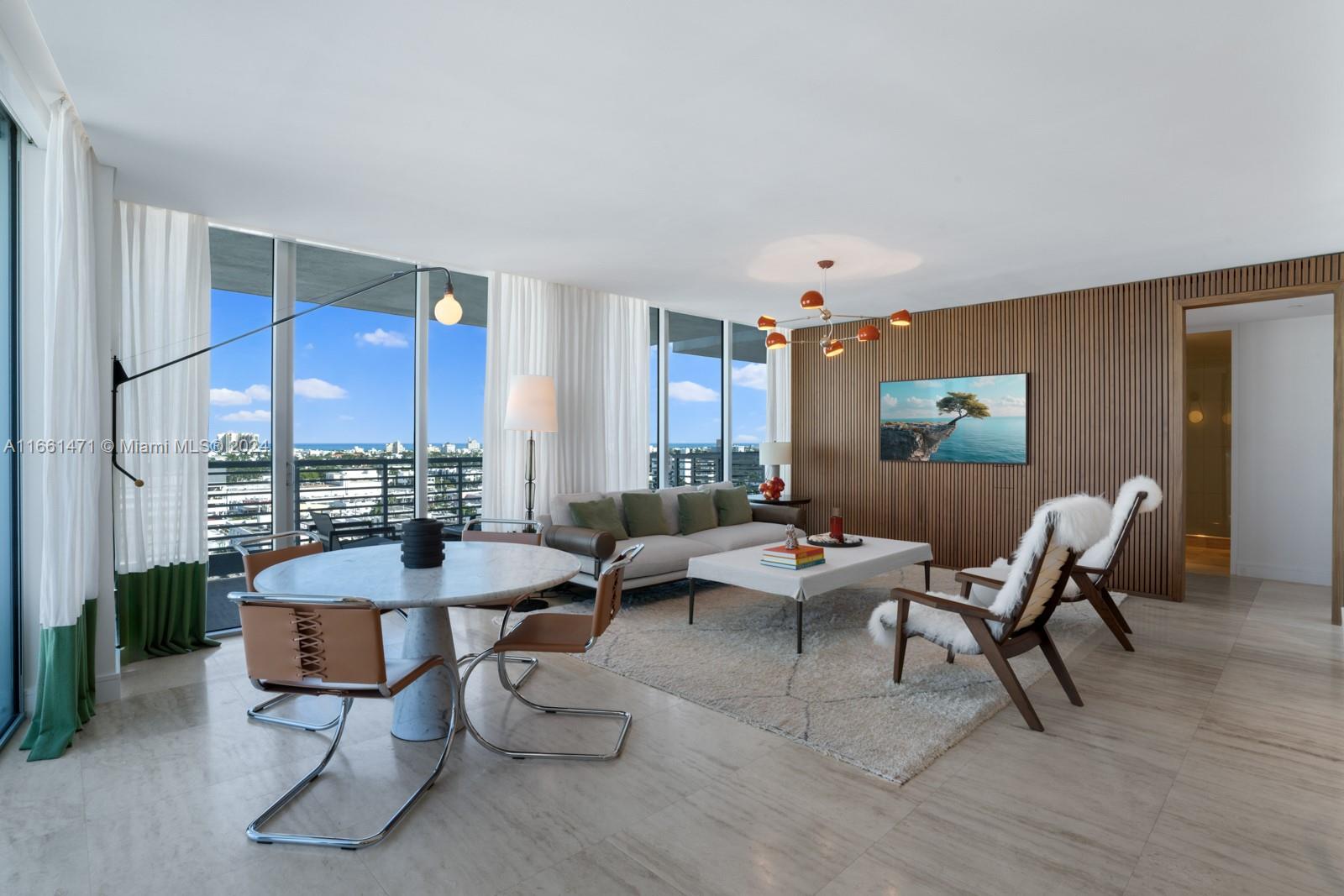 Step Inside with Me! Understated elegance at Upper Penthouse 5 at Capri - a Miami Beach luxury residence on beautiful Biscayne Bay. Floor-to-ceiling windows illuminate this designer 2BR/2.5BA corner apartment offering sweeping ocean & bay views. Thoughtfully updated, highlights include stunning millwork, travertine floors, cove lighting, and custom cabinetry & closets. A bright kitchen offers a sumptuous oversized marble island, Sub Zero, Wolf and Miele appliances, and elegant bar overlooking the bay. The beautiful primary bedroom suite offers a spa experience with dual vanities, soaking tub, and rain shower. Enjoy 5-star amenities including bayfront pool, fitness center, concierge services, and 24-hr security. Capri is perfectly situated just minutes from Sunset Harbour and Lincoln Road.