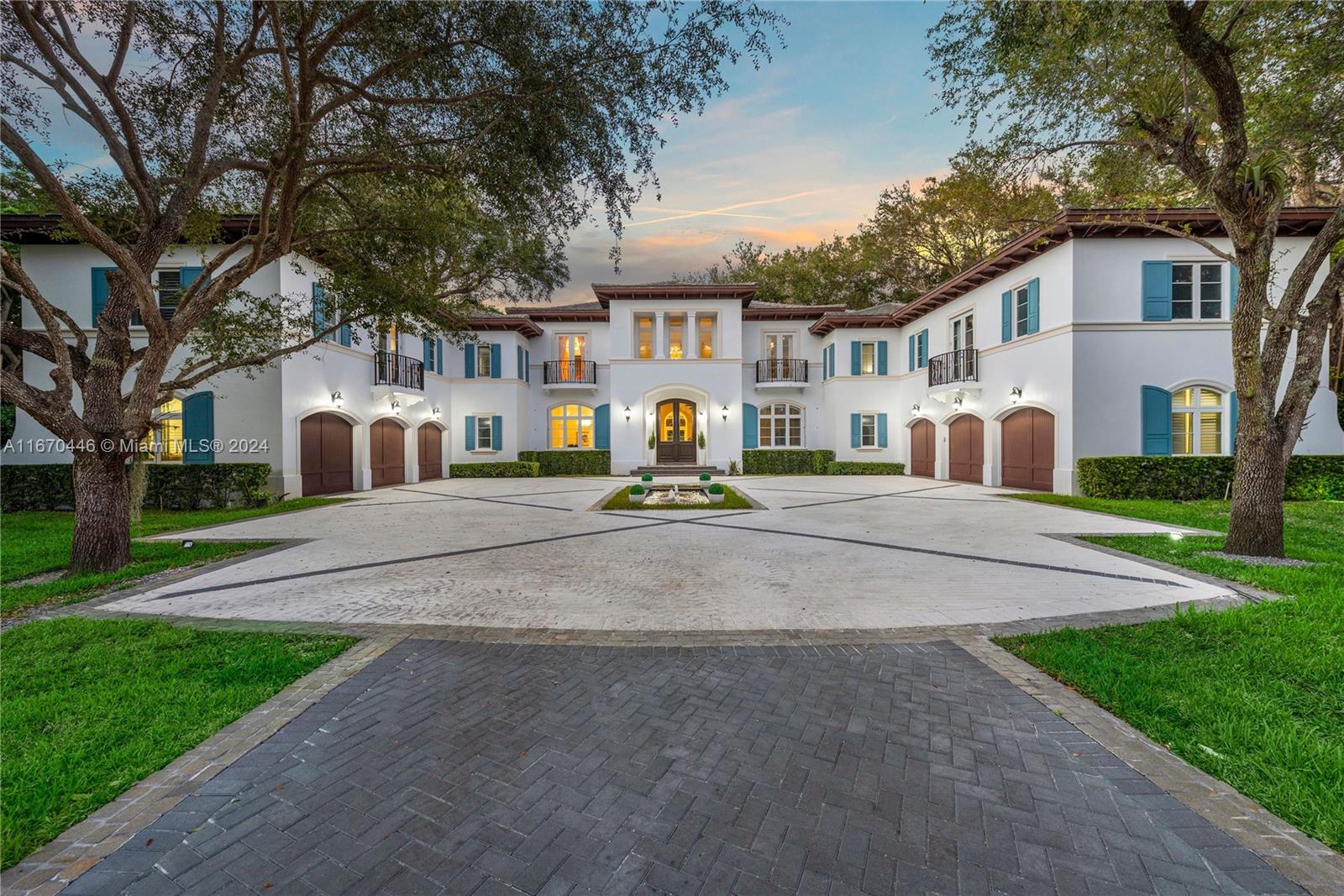 Palatial Neoclassical Estate on 1.2 park-like acres in guard-gated Snapper Creek Lakes! A perfect blend of classic and modern design, this entertainer's dream features an enormous entertainment wing with bar, media room, billiards room, and wood-paneled office. A separate wing is comprised of a movie theater and a private guest suite. Upstairs, you'll find 5 large bedrooms and the 4000sf master wing w/ gym (could be 9th bedroom), dual closets, luxurious master bath, large sitting room/office, and expansive terraces. Resort-style amenities include pool, summer kitchen, and cabana bath w/outdoor shower. Also, separate staff/in-law quarters and oversized garages for 6 cars. Includes access to a 40ft boat slip in Snapper Creek Marina.