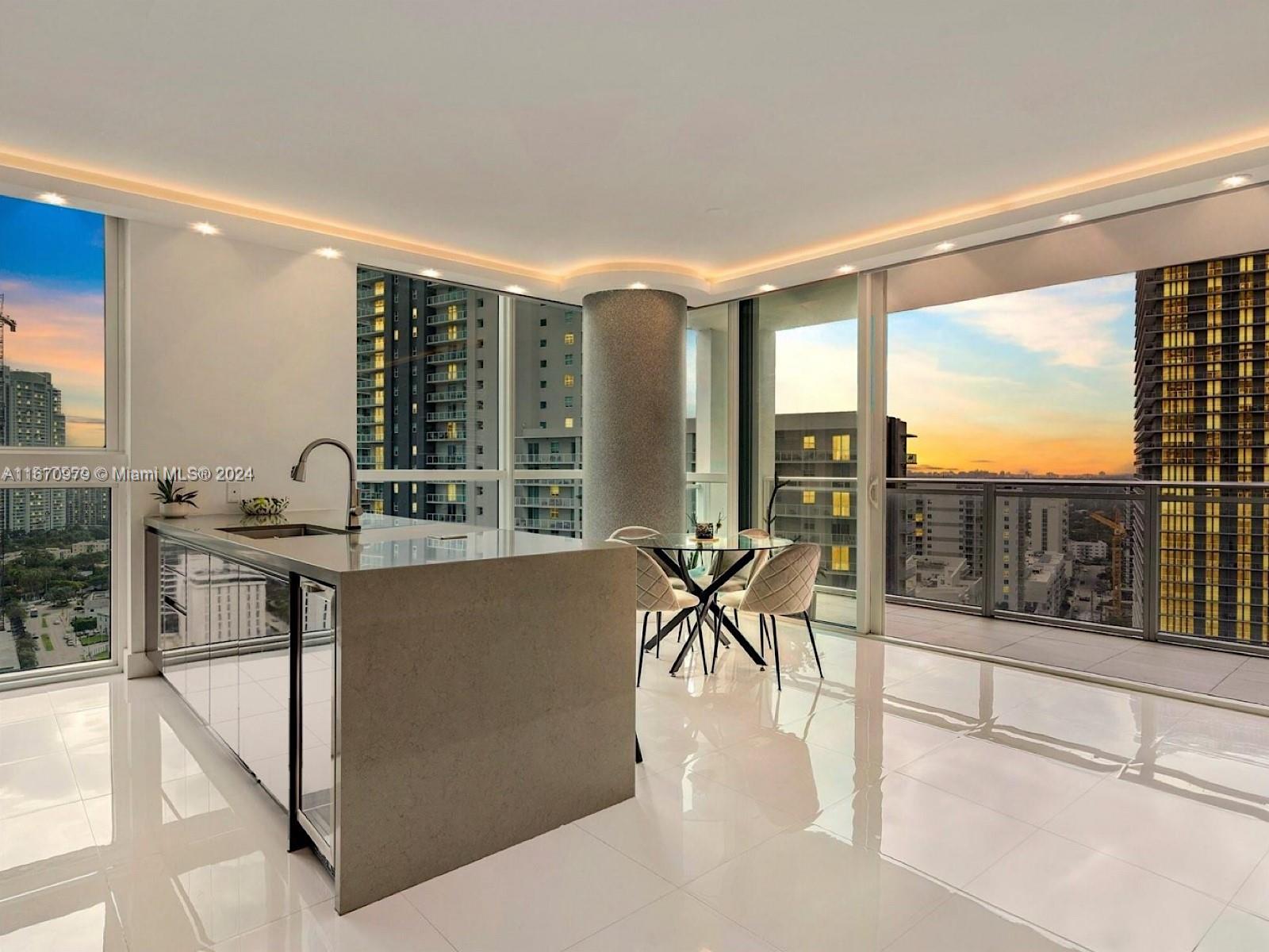 Enjoy stunning water views and Miami sunsets from this upgraded corner 2 bed, 2 bath fully furnished unit at The Bond on Brickell. Split floor plan with floor-to-ceiling windows, Bosch appliances, wine fridge, walk-in custom closets, electric blinds, Brilliant cove lighting, Nest system, and brand new washer/dryer. Second bedroom can be used as an office; couch is a pull-out. Rent includes Cable, Internet and one assigned parking space. 
Located in the heart of Brickell within walking distance to Brickell City Centre, Mary Brickell Village, Miami's top restaurants, shopping and nightlife. Amenities include a sundeck with lush landscaping, pool with cabanas, hot tub, sauna, steam room, kid's playroom, lounge, business and state-of-the-art fitness center. Easy to show.