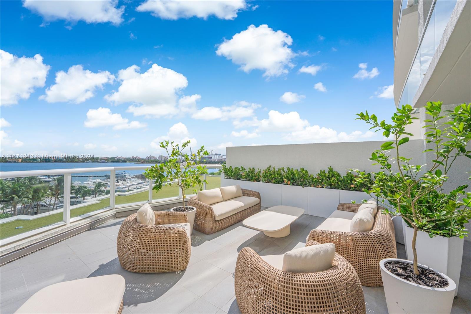 Beautiful renovated 2 bed plus den and 2.5 baths unique apartment at the Icon South Beach. The property features wood floors, huge living room and a huge terrace (+900sqf) with view of the Bay. Unit has been remodeled with top of the line finishings and high end appliances. Master bedroom features an EnSuite Bathroom with dual sinks, separate tub and shower and large walkin closet. Second bedroom also features EnSuite bathroom and great closet space. Den is furnished as an office. Separate Laundry area. The Building features a state of the art gym, Spa, restaurant, lounges & 2 community pools right above the Marina. Located on the 6th floor the unit has unique features: higher ceilings (12 feet), same floor access to the restaurant and main pool plus fast access to the gym and garage.