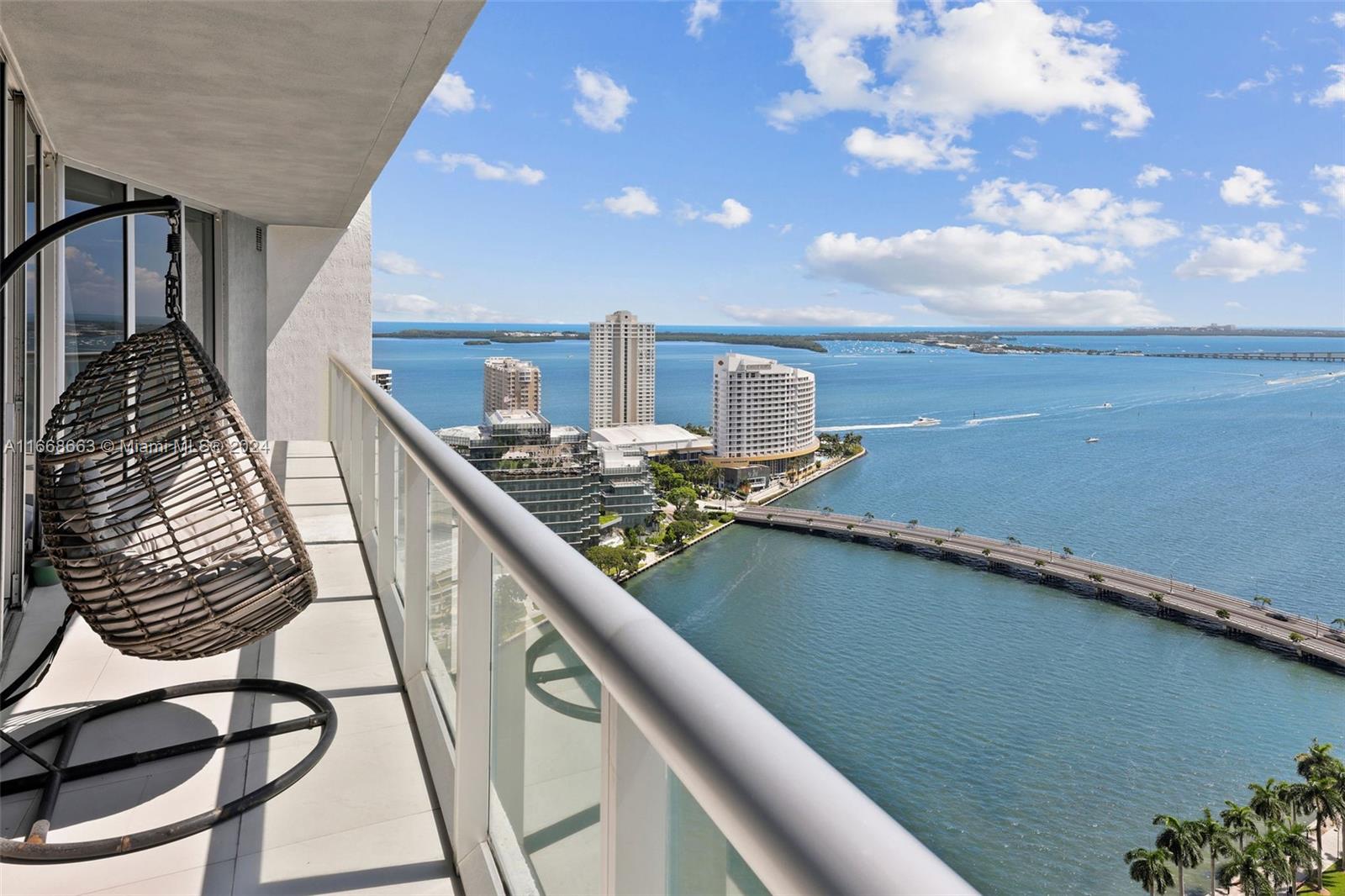 Welcome to luxury living at Icon Brickell. This stunning 2-bedroom, 2-bathroom unit with a den offers breathtaking direct ocean views from a large 215 square foot balcony, allowing you to enjoy Miami's vibrant skyline and serene waters from the comfort of your home. Step into an open-concept layout adorned with high-end finishes, floor-to-ceiling windows, and a modern kitchen perfect for entertaining. The spacious bedrooms provide a tranquil retreat, while the den offers versatility for an office or guest space. Experience world-class amenities, including a resort-style pool, spa, fitness center, sauna, and exquisite dining options. Located in the heart of Brickell, you're just steps away from trendy shops and nightlife. Your friends will never want to leave.