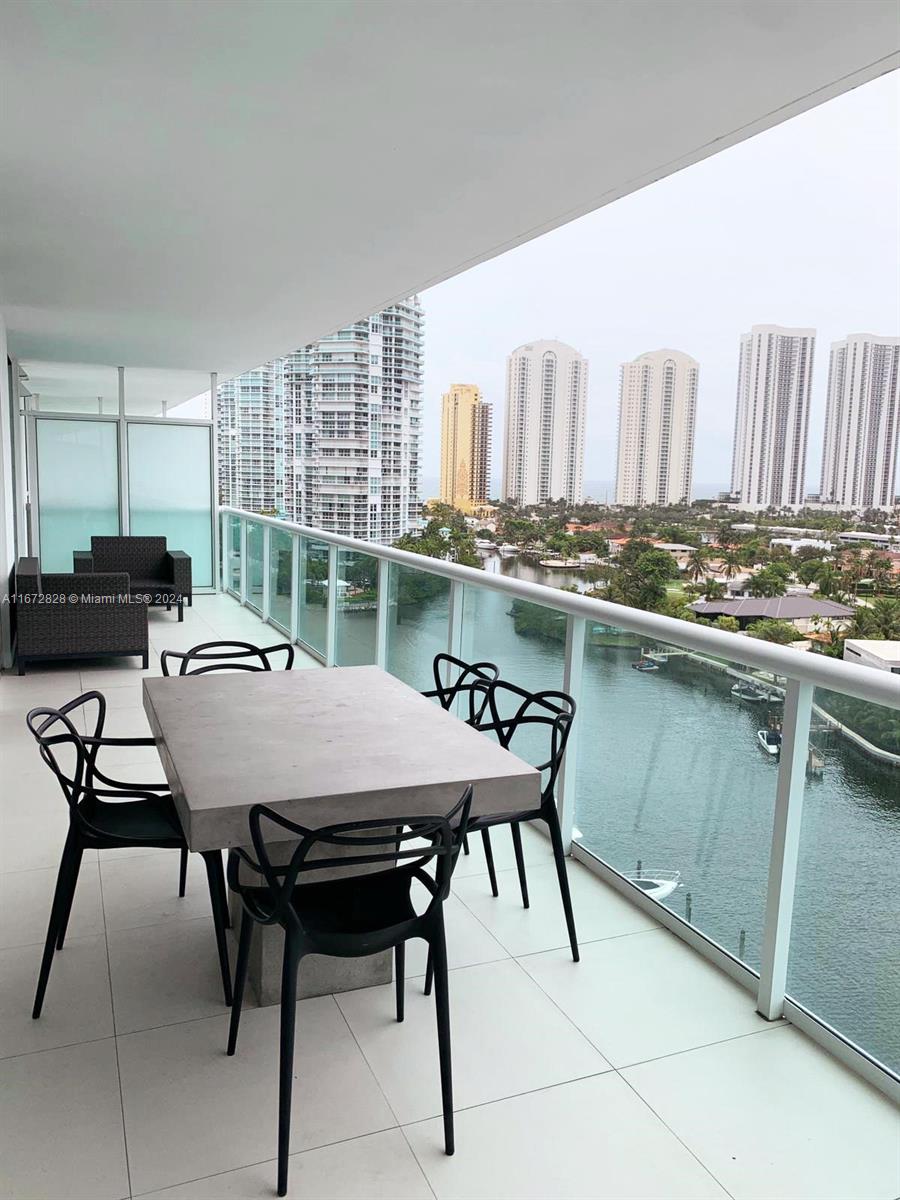 Stunning 2-bed, 3-bath condo at 400 Sunny Isles, fully furnished with top-of-the-line designer finishes. Enjoy breathtaking bay views from every room. The building offers endless amenities, including a bayfront pool, jacuzzi, aqua beds, cabanas, a luxurious spa, a fitness center, tennis courts, and an on-site restaurant. Walk to the beach or take the convenient shuttle service. Private marina with dock slips available for rent. Live the ultimate waterfront lifestyle in this exclusive, resort-style building!