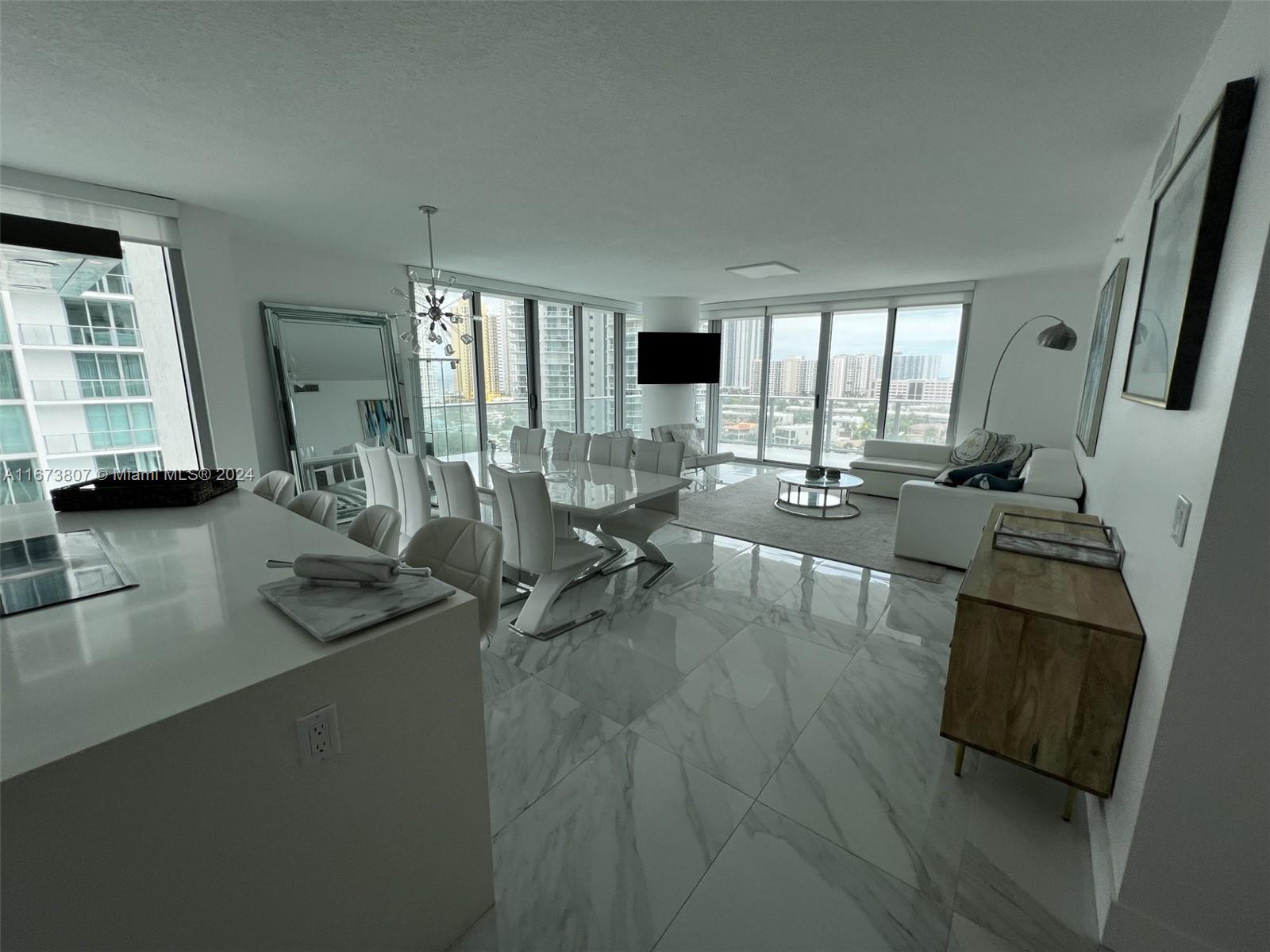 Sunny Isles on Intercoastal. Real full-size 3 bedrooms, 3 full bathrooms, and 1/2 guest bath. Each bedroom has its bathroom. All rooms have porcelain floors. Beautiful southwest views from each room. All rooms have custom closets. Spacious wraparound balcony overlooking the Intracoastal Waterway. The unit comes with storage space, assigned parking spaces + complimentary valet. Top-of-the-line amenities include a fitness center, yoga and aerobics room, movie theater, business center, tobacco room, three swimming pools, and children's play area. Low HOA fees. Don’t miss the opportunity to live in a place that combines luxury, comfort, and convenience. This apartment is perfect for those who want to enjoy an elegant and exclusive life in Sunny Isles Beach.