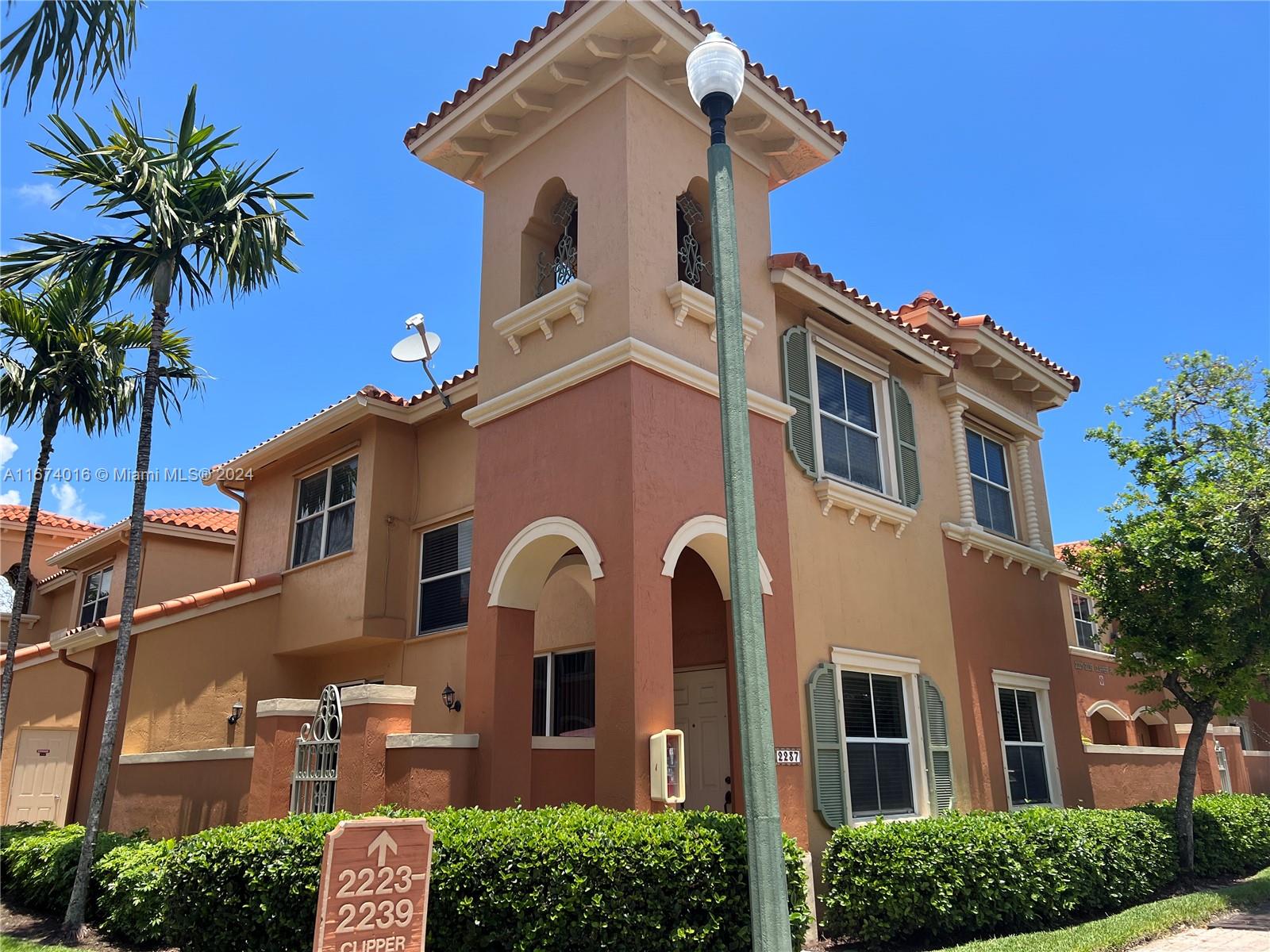 his corner townhouse, with three bedrooms and 2.5 baths, resides in the elite, guarded Villas at Harbor Isles in Dania Beach. Inside, find dark bamboo flooring and an enhanced kitchen with stainless steel appliances and marble finishes. The layout includes a dining room, living room, and an eat-in kitchen. The half bath is on the main floor, and bedrooms are upstairs. Parking is conveniently located, with extra spots for guests. Enjoy a resort-style pool, spa, hot tub, and playground. Located near I-95 and Hard Rock.