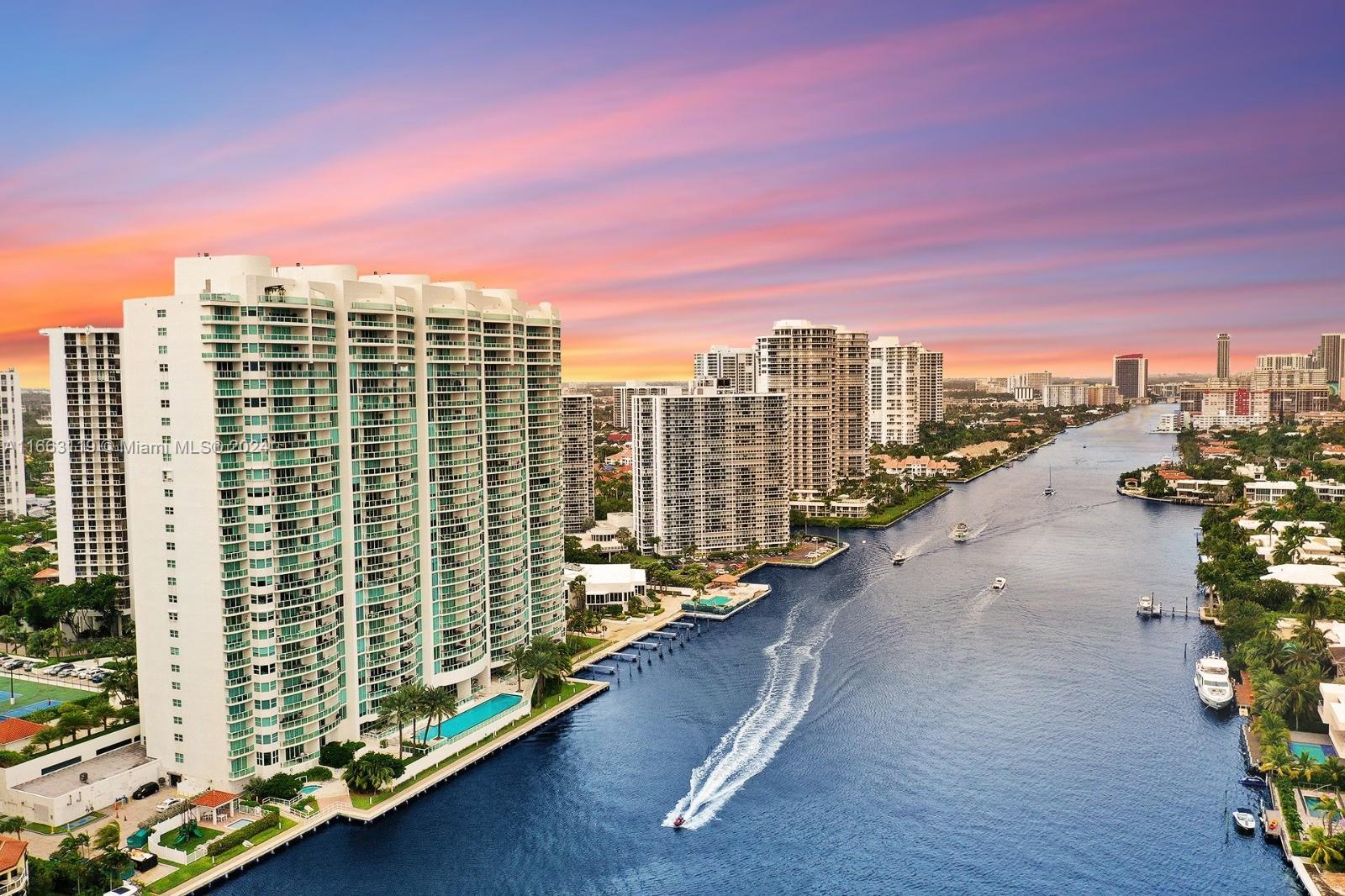 Luxury Living! Totally unobstructed vibrant water views. Located in the heart of Aventura, Hamptons South has spectacular views: ocean & intracoastal in the front; golf course, lake, and city in the back. Bright and light filled 3 bed, + den, 3.5 baths. 3264 Sq. Ft. Huge walk-in closets, spacious laundry room. Private elevator. Infinity pool, playground and kid’s pool. Movie theatre with 100 seats, restaurant, BBQ area, tennis courts, internet café. Fitness center, spa, tennis, and racquet ball courts. Party, kids and teens rooms.Only 5 minutes to the beach. 3.5 bike and walking path across from the property.