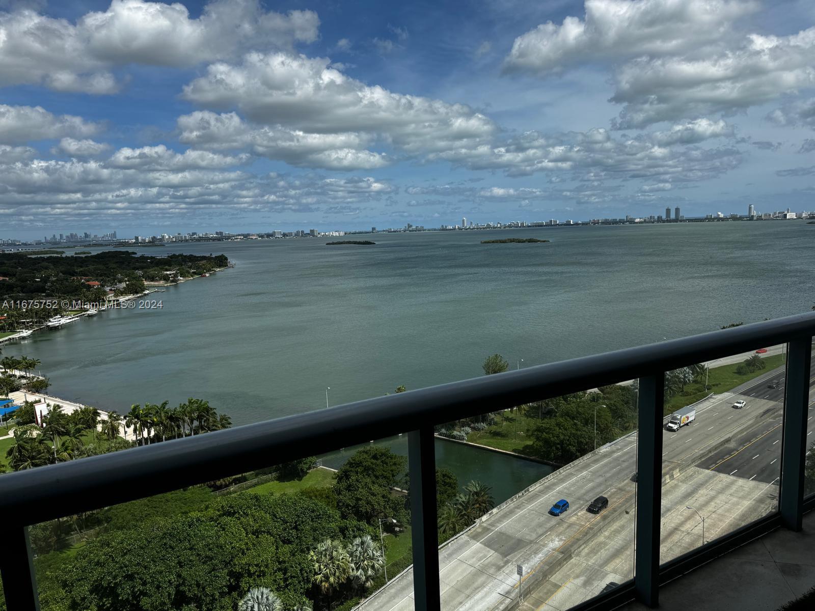 Experience modern luxury living at Blue Condo, situated in Miami's Design/Fashion District and offering breathtaking bay front views. This 1-bedroom, 1.5-bath unit features tall windows and high ceilings that showcase unobstructed views of Biscayne Bay. Recently updated in 2022. Minutes from South Beach, downtown, and the Design District. Enjoy a range of resort-style amenities, including two infinity heated pools, hot tubs, a movie theater, a state-of-the-art fitness center, a sauna, and a steam room. There’s also a party room, kids' play area, game room, business center, and BBQ area. 24/7 concierge service, valet parking, and an assigned parking space included in your rent. With a semi-private elevator foyer and easy access to Midtown's shops, Wynwood, and Miami International Airport.