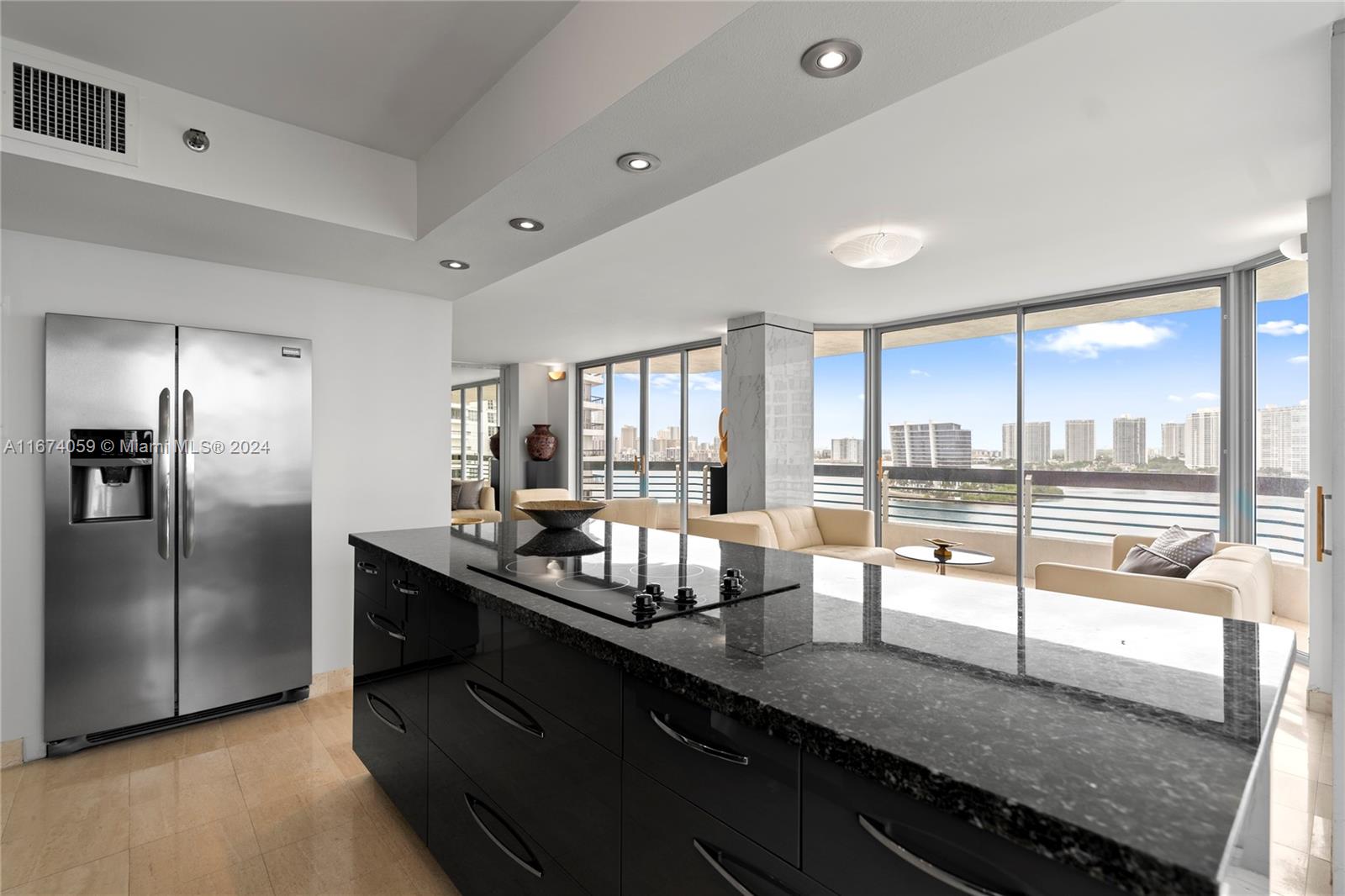 This contemporary corner condo in Mystic Pointe 300 offers breathtaking intracoastal and water views, creating a serene retreat. The spacious floorplan is flooded with natural light, highlighted by floor-to-ceiling windows. Every detail of this upgraded unit is exquisite, from the open-plan kitchen with state-of-the-art appliances to the modern, custom-designed cabinets. The primary bedroom features breathtaking water views, an ensuite bath and a walk-in closet. The second bedroom is equally stunning. Enjoy the wraparound balcony, ample storage, and in-unit laundry. Ideally located near houses of worship, Aventura Mall, beaches, and airports. Exceptional amenities include a pool, jacuzzi, gym, tennis, pickleball, basketball, restaurant, marina, dog park, and electric car stations.