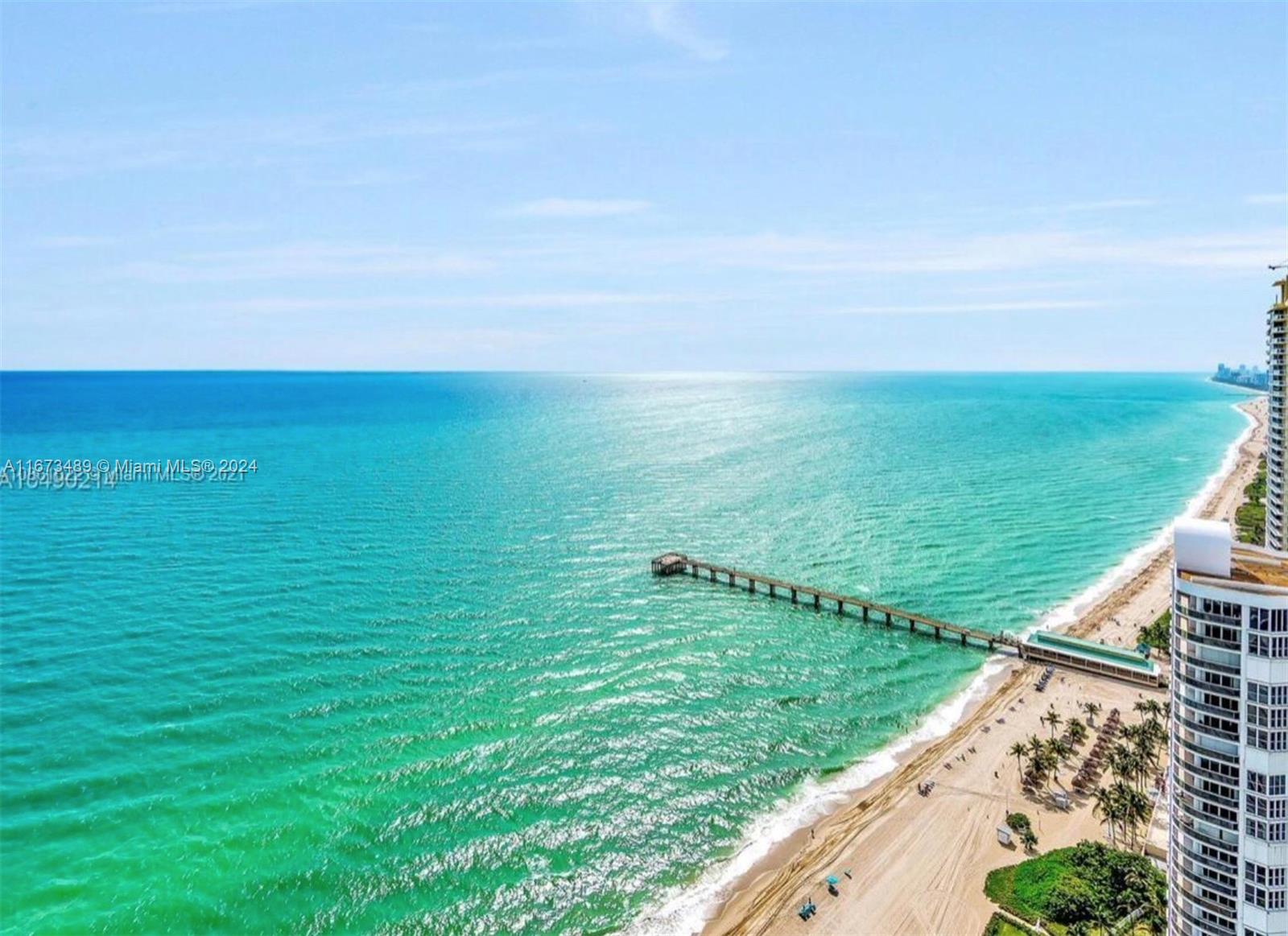 A modern masterpiece at 16901 Collins Avenue, Unit 3303, Sunny Isles Beach, FL. This stunning residence offers a luxurious waterfront lifestyle with breathtaking water views. Spanning 2511 square feet, this home features 3 bedrooms and 4.5 bathrooms, providing ample space for comfortable living. Upon entry, a private elevator whisks you to this high-rise sanctuary, where every detail exudes sophistication. The residence boasts an array of amenities, including a doorman, concierge services, and valet parking for ultimate convenience. Enjoy access to a common garden and outdoor space, perfect for relaxation. The building also features a gym, playroom, resident's lounge, and a common media/recreation room, ensuring every leisure need is met.