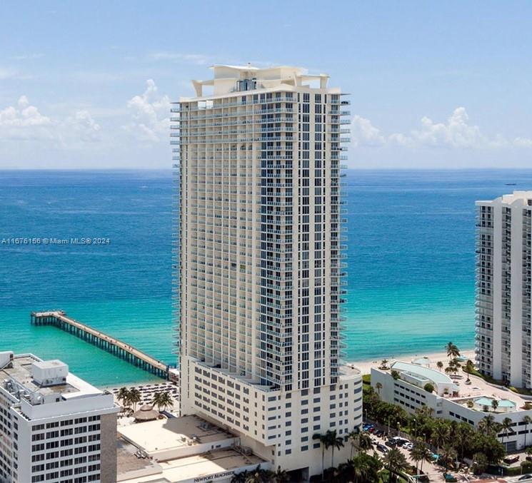 Great location and views in Sunny Isles, with easy access to the north, south and west expressway. The building amenities include a high-tech fitness and spa, 24 hour valet service, business center, party room, billiard room, climate-controlled pool, full beach service. The unit consists of two bedrooms and two bathrooms with a corner location giving way to amazing panoramic views. Full capacity washer and dryer in separate closet. Floor to ceiling tinted windows. Walk in closet in primary bedroom as well as an owner's closet. italian cabintry , stainless steel appliances in kitchen. Large wrap around balcony. Open kitchen, living area concept. Second bedroom sleeps 3. Marble floors throughout. Fully modernly furnished. Great opportunity for an amazing corner unit! Easy to show!