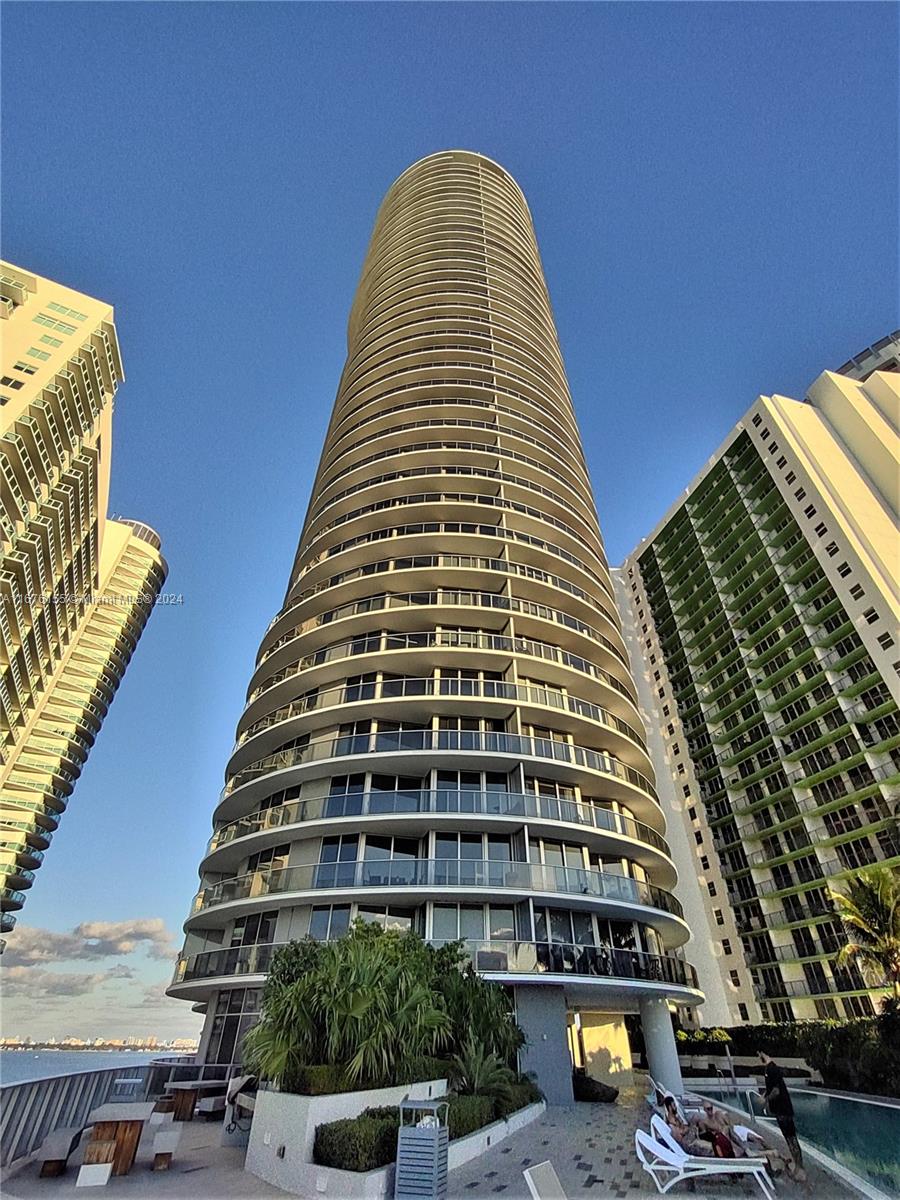 ***LUXURIOUS FULLY FURNISHED*** 43rd Floor Aria On the Bay, conveniently close to the elevator, 1 Bed 1/1 Baths W/Large balcony with a relaxing view of the bay and the city to enjoy the sunrise and sunset! Open kitchen with SS Appliances and European-style cabinets. Washer & Dryer in the unit.  The Rent Includes Cable/ Wifi and Hot Water. Spectacular FIVE STAR AMENITIES: 2 Heated Swimming Pools, Jacuzzi with an Amazing View, Movie Theater, Spa, Fitness Center, Yoga Studio, Party Room, Billiards Tables, Conference Room, BBQ Grills, Kids/Teens Playroom & Business Center. EXCELLENT LOCATION! Close to Museums, Restaurants, Parks, and More. Mits to SOBE, Downtown, Brickell, Wynwood & Midtown. SHOWING BY APPOINTMENT ONLY - It will be Available 11.1.2024 ** PETS MUST BE ANIMAL SUPPORT - PROOF **