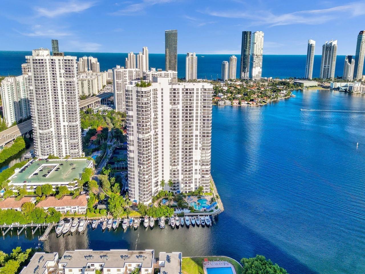 Lowest priced per sq ft in Mystic Pointe! Step inside this split 2 bedroom sanctuary in the sky! Bask in endless amazing city and water views of the Intracoastal Waterway & Biscayne Bay from every room and terrace! This home features plenty of natural light, an open kitchen, wood flooring and more! Low monthly HOA just $723! Mystic Pointe is a private and tropical sanctuary that features resort style amenities such as: 24 HR CONCIERGE, VALET, HEATED POOL, JACUZZI, FITNESS SPA, TENNIS, MARINA, CONVENIENCE STORE, DRY CLEANER, HAIR SALONS, RESTAURANT, JOGGING & DOG PARK. PET FRIENDLY COMPLEX. PRIME LOCATION CLOSE TO WORLD CLASS BEACHES, SHOPPING, DINING AND ENTERTAINMENT, CASINOS, MAJOR AIRPORTS, THE TURNBERRY PGA GOLF AND RESORT, WALKING COMMUNITY 3.5 MILES PATH.