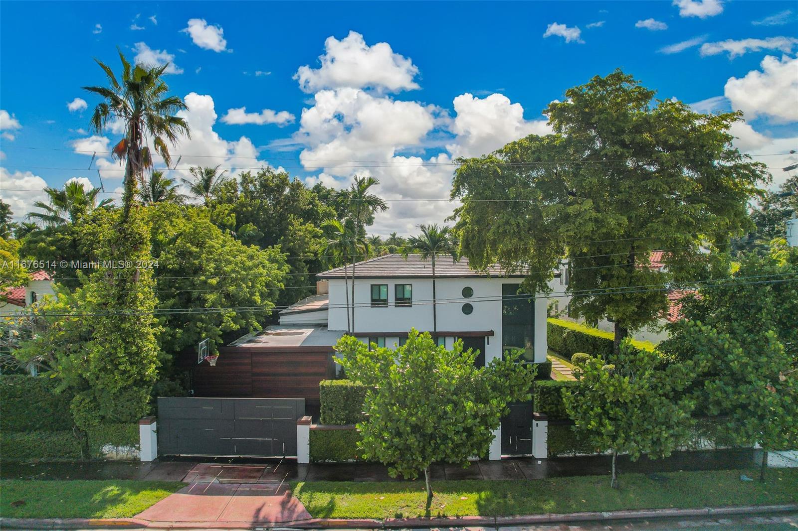 ~ Fabulous Modernized Art Deco Home In The Heart of Miami Beach ~ Upon Entering This 4 Bedroom / 4.5 Bathroom Home You Immediately Feel A Sense of Tranquility ~ The Inviting Natural Light Filled Lower Level Features the Living Room, Den, Dining Room, Kitchen, Family Room, Guest Bedroom & Cabana Bathroom ~ The Updated Kitchen Boasts a Casual Dining Island & Stainless Steel Appliances ~ The Upper Level Calls Your Attention to the Exquisite Primary Suite Which Includes a Sitting Area, Walk-In Closet & Primary Bathroom ~ A 2 Bedroom / 1 Bathroom Children's Wing is Also Found In The Upper Level ~ Spend Your Days & Nights Barbecuing Under The Large Covered Terrace and Relaxing By The Gorgeous Oversized Pool ~ This Gated Home Offers The Best of Living The Miami Beach Lifestyle ~