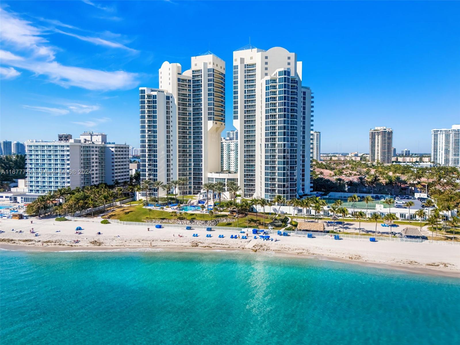 Spacious flow thru lower penthouse unit with direct views to the ocean and intracoastal. Arrive at your sky apartment from your private lobby.2 bedrooms + den + powder room. 
Kitchen has all new appliances: cooktop, refrigerator, doble oven and microwave, dishwasher. Extra large pantry room
Separate laundry room with new washer and dryer. 
Custom closets and blinds. 
This building has all the amenities: valet, concierge, pool service and beach service, spa, gym and tennis courts.