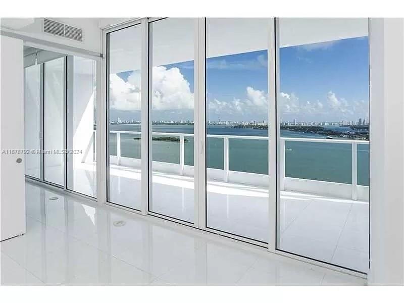 AMAZING AND DIRECT VIEWS OF BISCAYNE BAY & MIAMI BEACH. WHITE PORCELAIN AND STATE OF THE ART APPLIANCES. LUXURY LIVING AT THE MODERN PARAMOUNT BAY WITH WORLD CLASS AMENITIES. ELEVATOR WITH PRIVATE FOYER ENTRANCE. GREAT LOCATION WALKING DISTANCE TO ADRIANNE ART CENTER, MARINA AND PARK. SHORT DRIVE TO WYNWOOD, DESIGN DISTRICTAND SOUTH BEACH