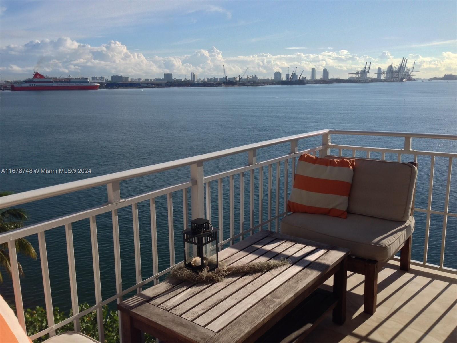 Stunning waterfront views throughout this renovated Brickell Key corner unit with Italian marble floors, high end stainless steel appliances, professional LG washer/dryer and spacious California closets. Second parking space optional.