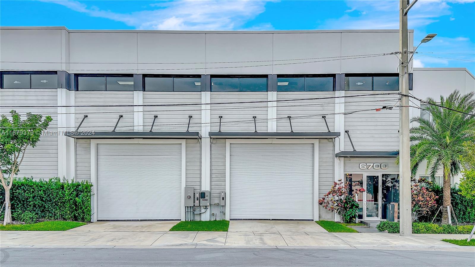 This brand-new 6,220 sq ft warehouse offers a perfect blend of functionality and style. The upstairs office area features two private offices, a large open space, kitchenette, and bathroom, all surrounded by impact windows. The warehouse boasts 30 ft ceilings, full AC, and three large street-level overhead doors for easy access. A mezzanine adds extra space, with a bathroom and shower on the ground floor. Equipped with a handicapped elevator, this space is perfect for a showroom, car storage, or e-commerce business, importer or exporter,  wine​​‌​​​​‌​​‌‌​‌‌‌​​‌‌​‌‌‌​​‌‌​‌‌‌ business.