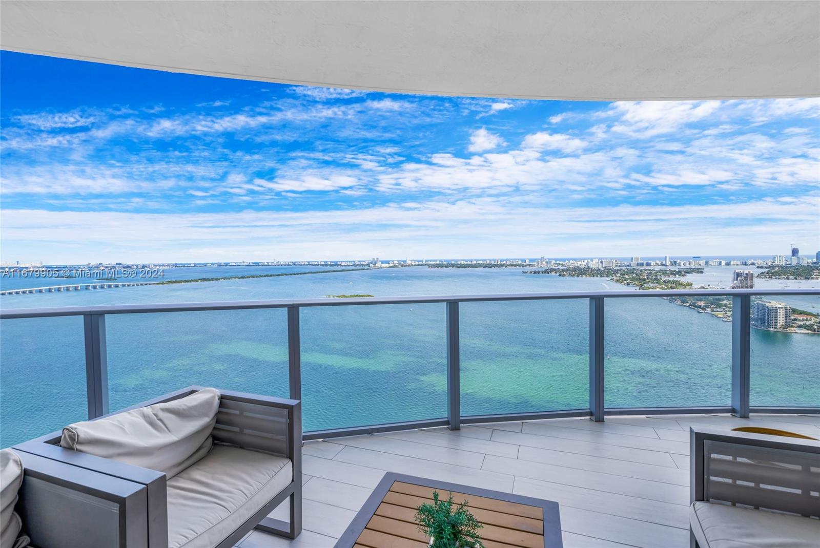 Beautifully remodeled and updated, this luxurious corner residence boasts breathtaking unobstructed, direct intracoastal, ocean & city views of the Miami Skyline. With 2 private elevators, private foyer, 3 bedrooms, den, 4 full bathrooms & 2 assigned covered parking spaces, this residence offers unmatched convenience, in the heart of Miami. Experience Miami's most stunning residential development that epitomizes luxury and modern living, this architectural gem offers an unparalleled lifestyle with its prime waterfront location, striking design, and an array of world-class amenities. Located in the heart of the city minutes to all that Miami has to offer! Offered fully furnished, turn-key. Owner is moving out of state and offering 25% reduction in the lease compared to 6 months ago.