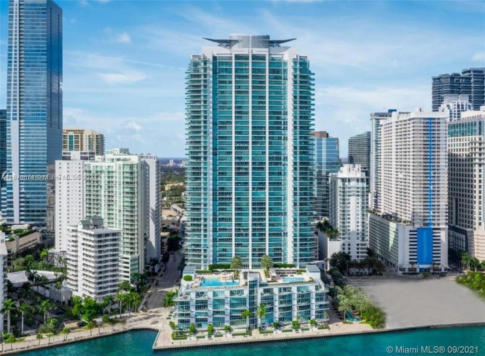 Experience unparalleled luxury with breathtaking Bay and City views from this stunning corner residence on the 26th floor of the exclusive Jade Residences in the heart of Brickell
This magnificent 2-bedroom, 2-bath home offers the ultimate in privacy with its own elevator and foyer entrance. The split floor plan has been beautifully upgraded, featuring a custom-designed dressing room, bespoke vanities, and modernized bathroom finishes. Additional highlights include elegant marble floors, cove and state-of-the-art LED lighting, motorized solar shades, and more
Indulge in resort-style amenities, including two elevated pools with sweeping views, a world-class spa and gym, a community party room, 24-hour security, valet service, and much more designed to elevate your luxury living experience