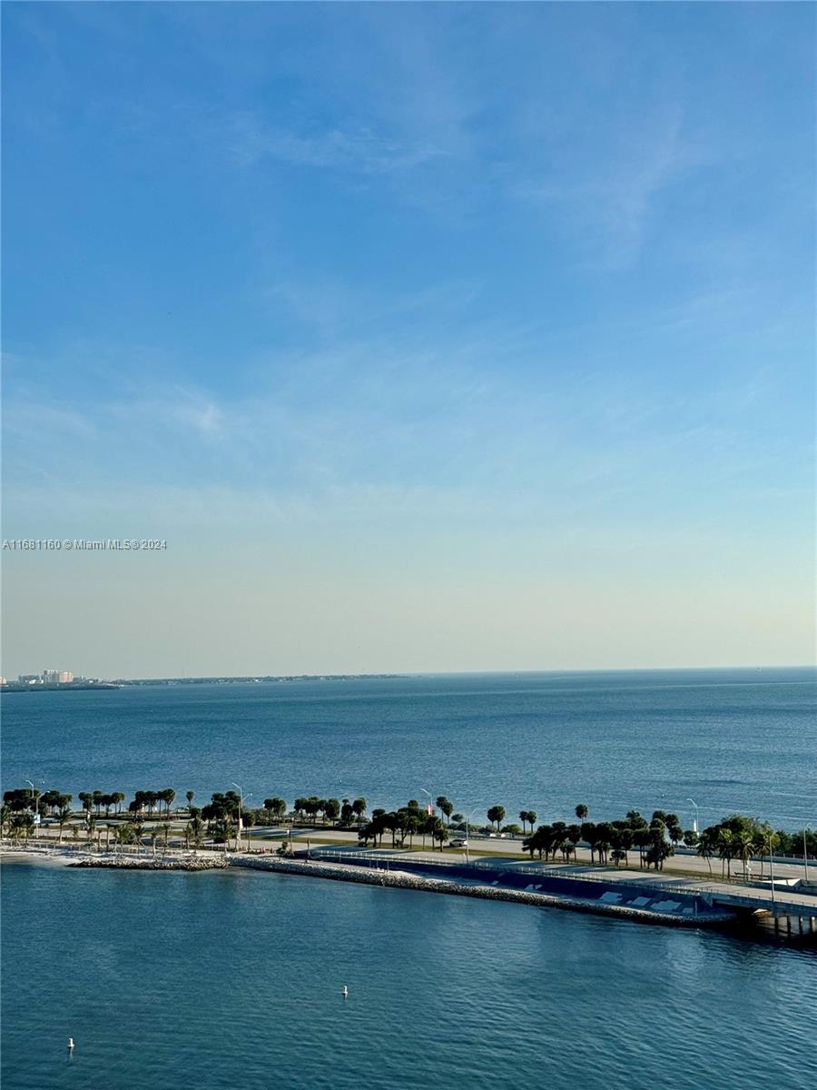 Experience the perfect blend of comfort and luxury in this bright and spacious 1 bed/1  bath condo at Brickell Town House. Wake up to unobstructed breathtaking panoramic views of Biscayne Bay and the ocean. Start your day with coffee on the large private balcony, enjoying the fresh sea breeze, before heading out for a peaceful walk at beautiful Brickell Ave. Rent includes A/C, water, cable, Wi-Fi, Fast internet, tennis, a state-of-the-art gym, and more. Located on Brickell’s waterfront in a safe residential area, it's close to I-95, free public transit, shops, restaurants, markets, and Brickell City Centre. Only 12 minutes from MIA, with excellent security and unobstructed views.