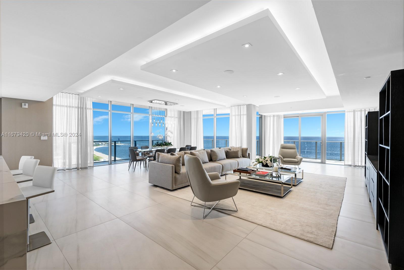 This stunning upper penthouse is located in the brand new Solemar Beach, a direct oceanfront boutique condominium in Pompano Beach with unparalleled amenities and state-of-the-art conveniences. Designed by Meyer Davis Studio and furnished by Interiors by Steven G, the penthouse offers stunning ocean vistas; a flow-through contemporary floor plan; and a dedicated private roof space with large summer kitchen; half bath; plunge pool; and endless ocean, Intracoastal and city sunset views. Boasting over 4,600 square feet, the residence has four bedrooms plus staff quarters and five full and one-half baths. Situated on 250 feet of direct ocean frontage, Solemar Beach offers the finest amenities and services one would expect to find at a brand new oceanfront condominium. Luxe living awaits