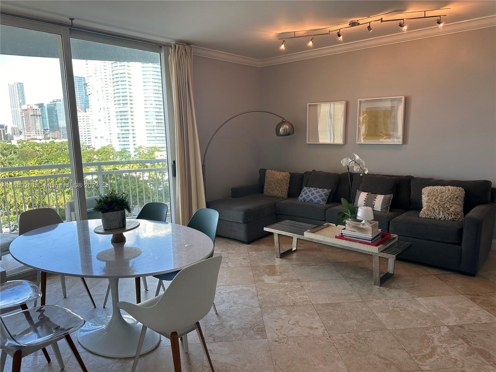 Stunning 2 bedroom, 2 bath condo in the Metropolitan. FULLY FURNISHED. Located in a prime Miami setting, this unit offers breathtaking Biscayne Bay views, perfect for soaking in the serene surroundings, marble floors, washer and dryer, walk-in closet, impact windows. Residents enjoy top-tier amenities, including 24-hour concierge, complementary valet parking,1 assigned parking space (No.441), fitness center, pool, 2 tennis courts and more. Live in luxury while being minutes away from the best Miami has to offer.