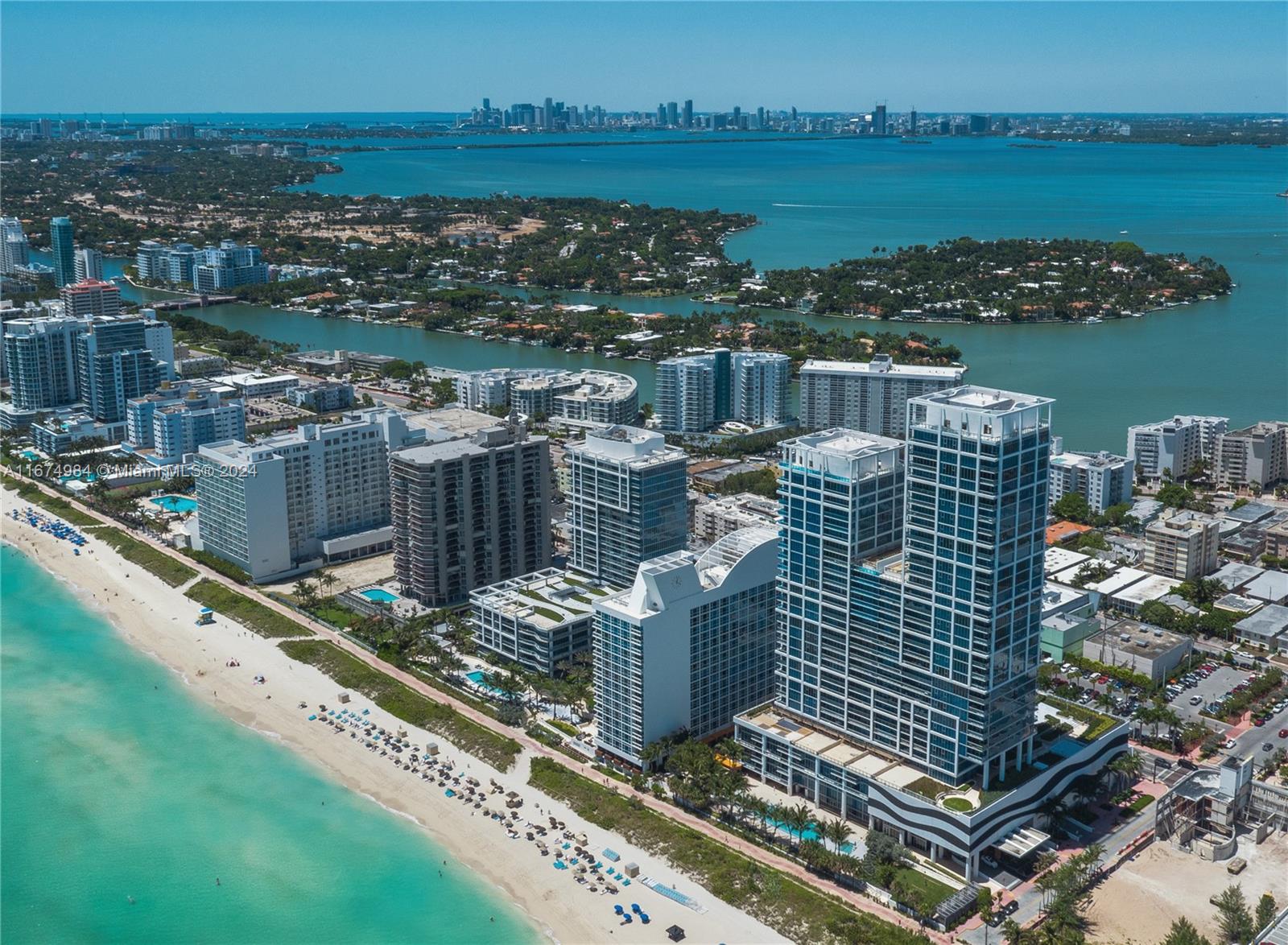 Beautiful ocean & city views from this south facing 2 bed 2 bath in the exclusive Carillon. High-end appliances, exquisite finishes & floor-to-ceiling windows of endless ocean, bay & city views from every room and fabulous balcony. Residency includes access to Carillon Resort's 6 oceanfront acres of exclusive services & accommodations: Voted #1 Resort in Florida! An unforgettable experience with 4 gorgeous pools,private beach attendants/ service, a 70,000-sqft spa & wellness facility offering 20+ classes/week, yoga, Zumba, spin & more all included!!! Home to an indoor rock climbing wall, Salon & Organic Restaurant with a delicious wellness and seasonal menu. Super location, Publix & Starbucks across the street. Near Miami Beach's main travel arteries: Alton Rd./41st./195/I95. Door #1106