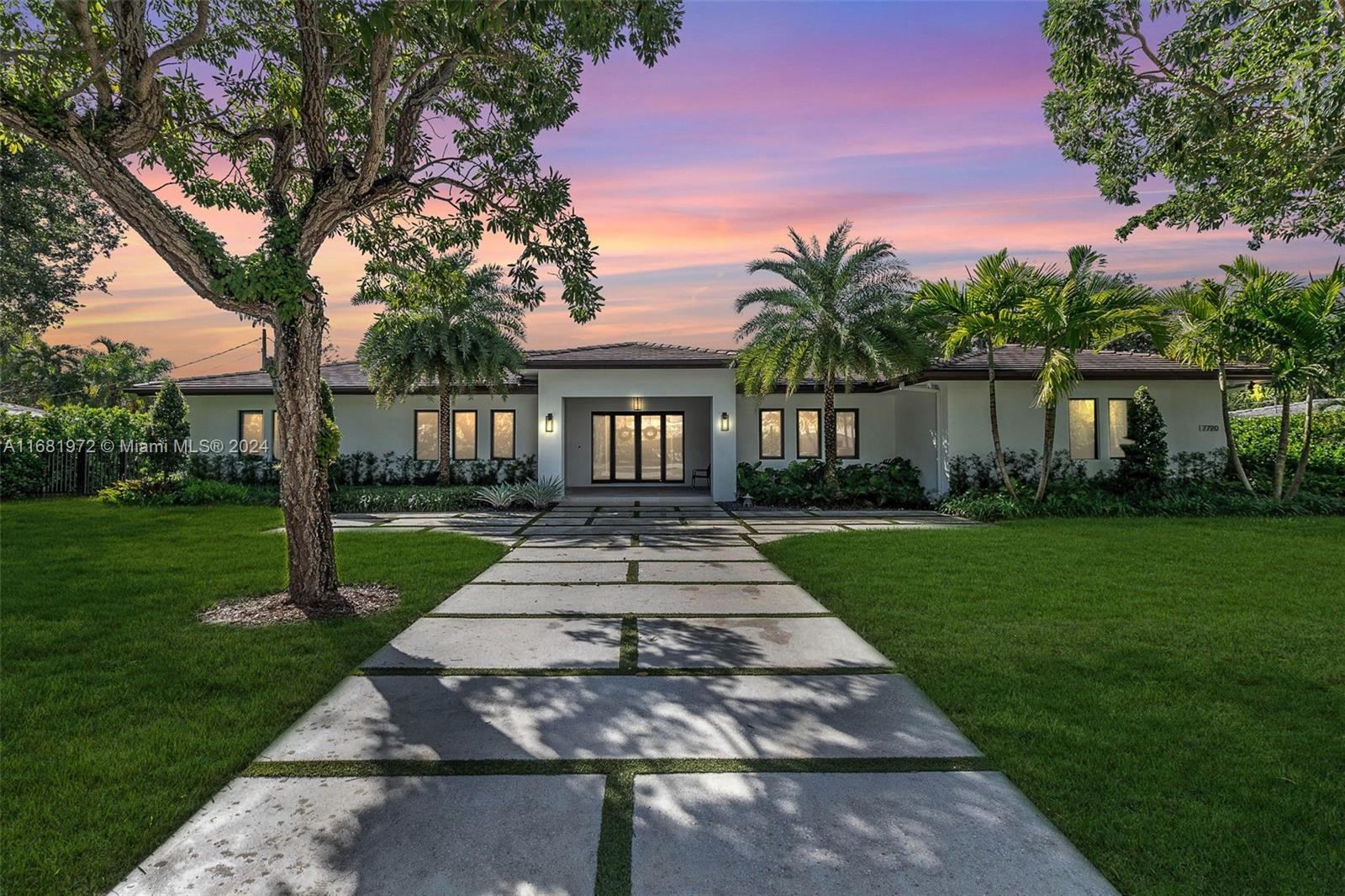 Sophisticated & modern 4 bdrm, 4.5 bath masterpiece, remodeled to perfection in 2021 on a serene half acre lot in the Village of Pinecrest. Fabulous open living area w/ 10 ft ceilings & sliding glass doors w/ views of the pool & garden. Gorgeous kitchen w/ quartzite countertops, handcrafted cabinetry, oversized island w/ seating, Thermador smart appliances. The ultimate formal dining rm perfect for a holiday gathering. Ideal split floor plan w/ en suite guest bdrms & secluded primary suite w/ stunning bath, complete w/ wet room, & walk-in closet. Impact windows/ doors, custom window treatments. Deep covered terrace, inviting saltwater pool w/ water features, summer kitchen, Bose surround sound. 2 car side entry garage w/ excellent storage. Centrally located near shops, restaurants & parks.