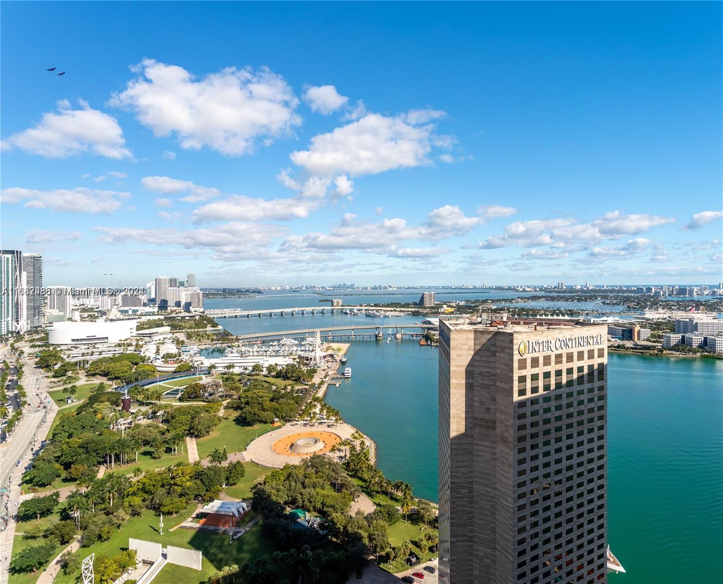 Spacious and fully renovated one-bedroom apartment at prestigious One Miami. Beautiful high floor with stunning panoramic water views of the Bayfront Park, Biscayne Bay, and Miami Skyline. New Terrazzo floors, custom LED lighting, and smooth ceiling throughout the unit. Magnificent open kitchen with massive countertop, full-height pantry, and backsplash, large deep sink, new custom cabinets with double depth wall, new appliances including a built-in microwave/convection oven. Additional to the walk-in closet, the principal bedroom has a full wall of closets! One Miami offers resort-style amenities including a pool, (under construction til January 2025) spa, fitness center, 24hr concierge, valet, etc. Close to downtown, Bayfront Park, Whole Foods, Cinema and more...