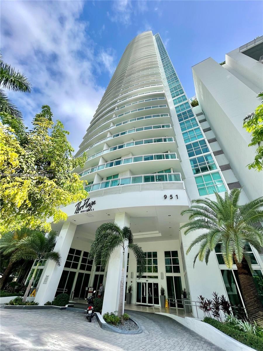 Beautiful 34th floor unit at The Plaza, overlooking prestigious Brickell Ave. Kitchen with pantry & peninsula breakfast-bar that continues into the main living space. Hallway with full bathroom connects the living area to the bedroom, giving guests direct bathroom access. Washer & dryer inside the unit. The West facing balcony gives you breathtaking sunsets overlooking Brickell Ave and the dazzling lights of city living. Amenities include resort style pool & jacuzzi, assigned covered parking, BBQ area, sauna, fitness center, Social Room & Billiards, business center, bike storage and 24 hour concierge and valet parking service. Plus, you're just an elevator ride away from all the action in Brickell and Downtown. Easy to show. Unit also for sale.