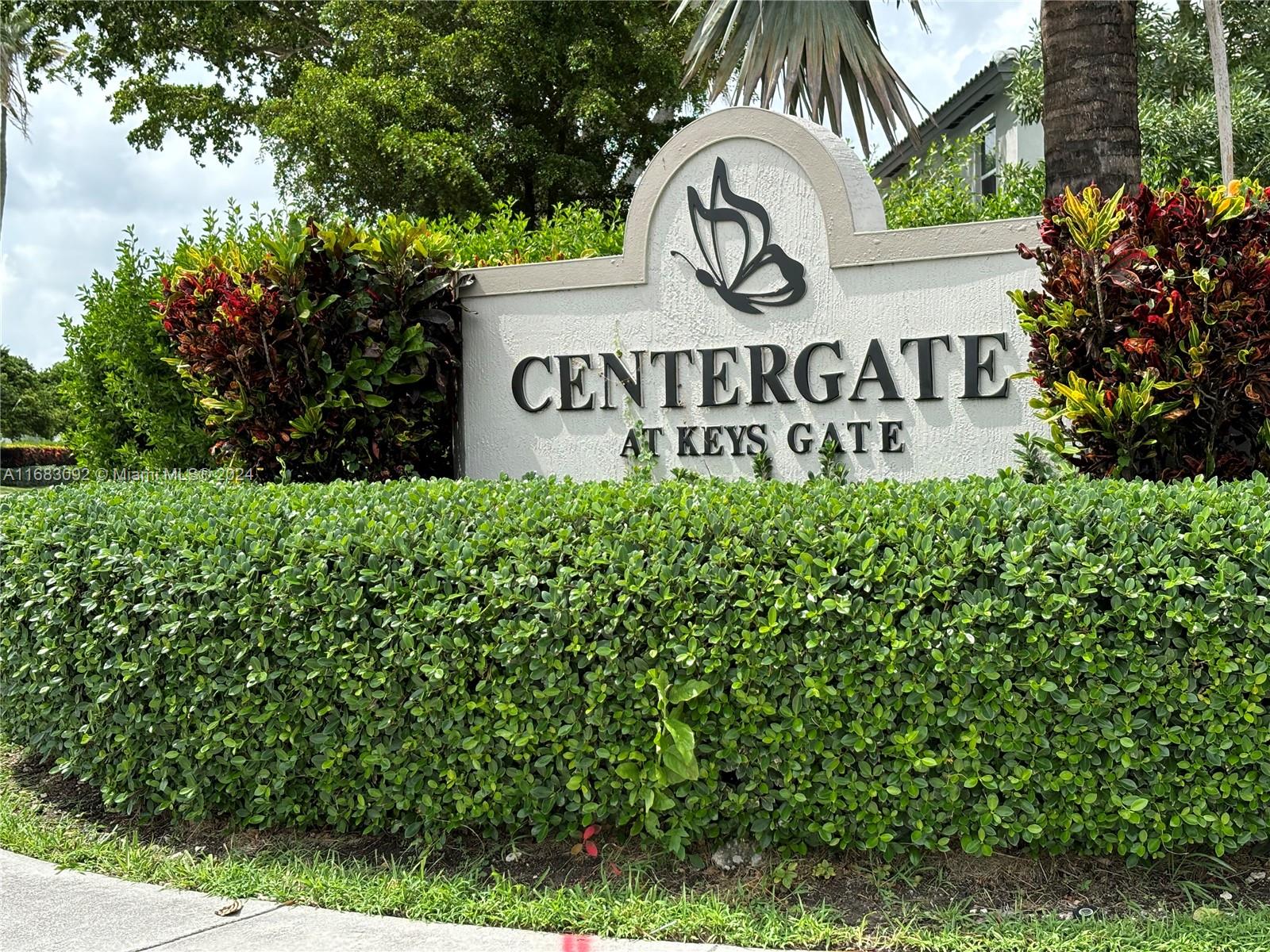 Beautifully updated first floor condo with no steps!  Ready to move in.  Two large bedrooms and two full baths. Renovated primary bath and kitchen. Washer/Dryer in unit.  Screened patio with garden view. Accordion Hurricane shutters.  Well-maintained Keys Gate - Centergate neighborhood with guardhouse and roving security.  Enjoy worry-free living with monthly HOA including cable, internet, water/sewer, trash, pest control, security, building roof & grounds maintenance, tennis & racquetball, Royal Palm Clubhouse swimming pool, hot tub, sauna, fitness center, billiards, library, game rooms.   Conveniently located between Miami and the Florida Keys with easy access to Turnpike and US 1. Only three miles to Homestead Hospital.   No CDD. Association has reserves.  AC & H/W heater replaced 2019.