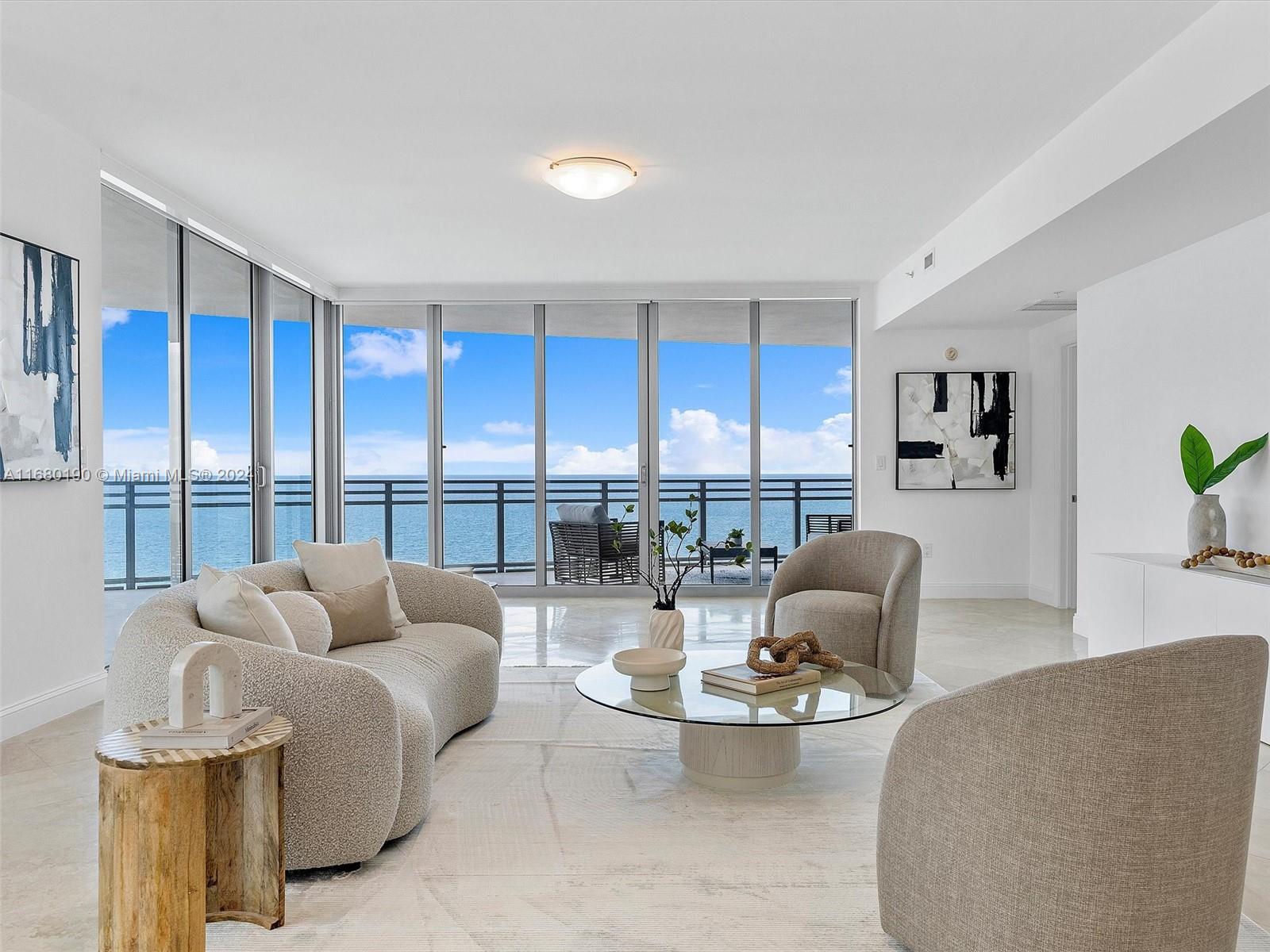 Experience oceanfront luxury in this stunning 3-bedroom, 3.5-bath residence at the prestigious Diplomat Residences. With nearly 2,800 sq. ft. of living space, this home offers floor-to-ceiling windows and unobstructed views of the Atlantic Ocean and Intracoastal Waterway. Step off your private elevator into a bright, open living space adorned with sleek modern finishes and elegant touches. The gourmet kitchen, master suite with expansive custom closets, and luxurious spa-like bathrooms provide a perfect blend of style and comfort. Enjoy breathtaking views from every room and relax on the wraparound balcony. Resort-style amenities include a heated pool, beach service, fitness center, game room, theater, and access to the Diplomat Hotel with a 15% discount at its restaurants and spa.