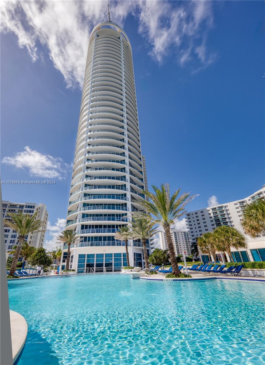 BREATHTAKING VIEWS, 2 LARGE BALCONIES, FLOOR TO CEILING WINDOWS, 2760 Sq Ft 3 bedroom,& only 4 flights up to 7th floor, close enough to hear the waves. Elevator opens to private foyer, kitchen is wood, stainless, & granite with expanded breakfast room, walk-in closets, laundry room, Hunter Douglas shades, 2 PARKING SPACES, even a Publix across the street! Resort amenities include ,tennis 2-story fitness center windows facing spectacular pool & 240-foot beach. PERFECT LOCATION near Broadwalk, minutes from Fort Laud airport or Aventura Mall. ****DOG FRIENDLY BUILDING***Condo can include PRIVATE CABANA facing pool & beach if not already sold.