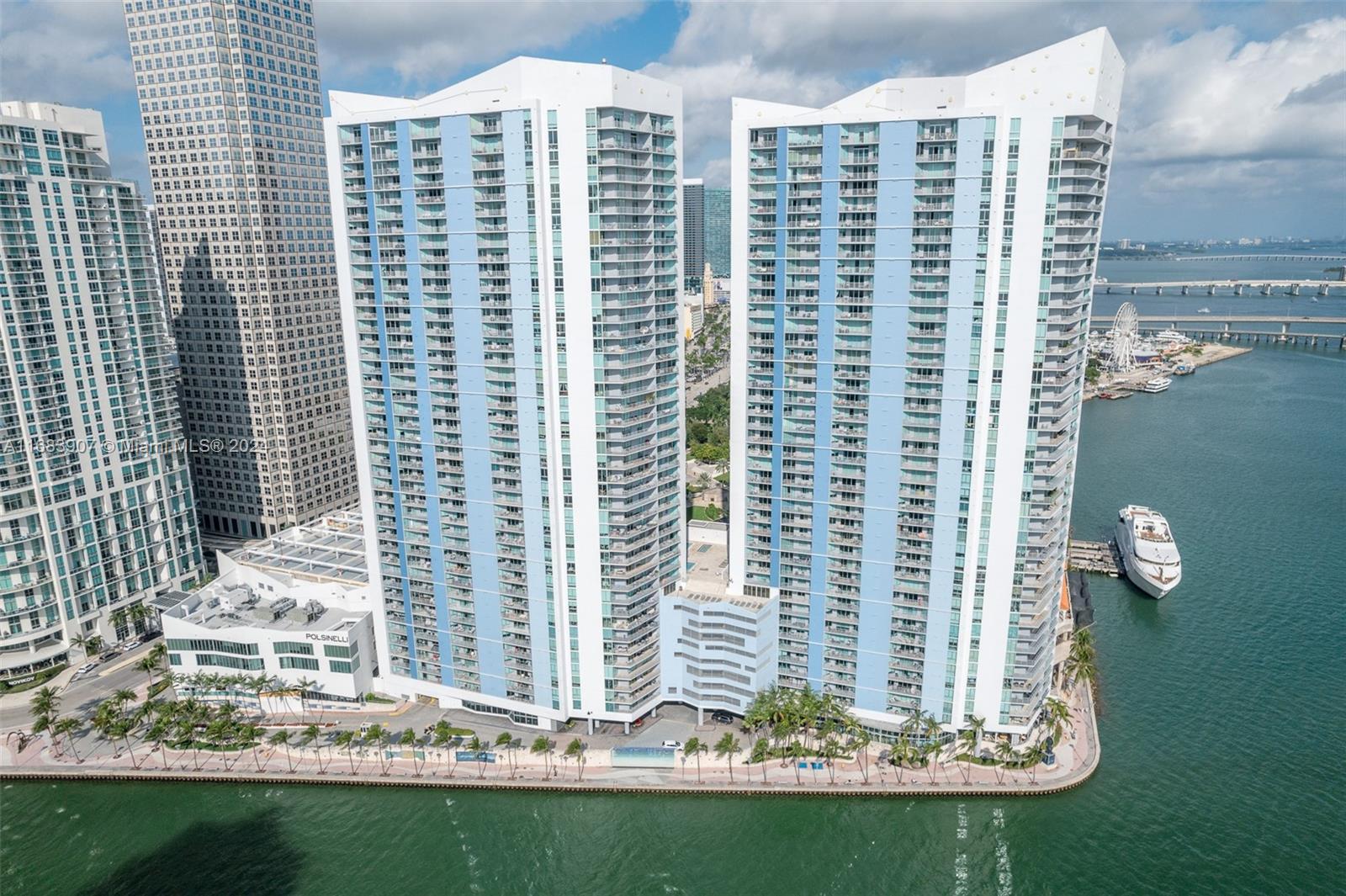 Downtown Miami apartment with breathtaking views of Biscayne Bay, Bayside and Bayfront Park. This 3 bedroom 2 bathroom apartment features travertine flooring throughout, California closets in each bedroom. Brand new A/C and washer/dryer. Building amenities are two pools, jacuzzi, two gyms, two party rooms, sauna, kids room, business center, and EV charging. Five star Italian restaurant Il Gabbiano and Mastros Steakhouse located in the building. Within close distance to Brickell, Bayside, Bayfront Park, Restaurants, Shops.  Only a 10 minute drive to Miami Beach and Wynwood.