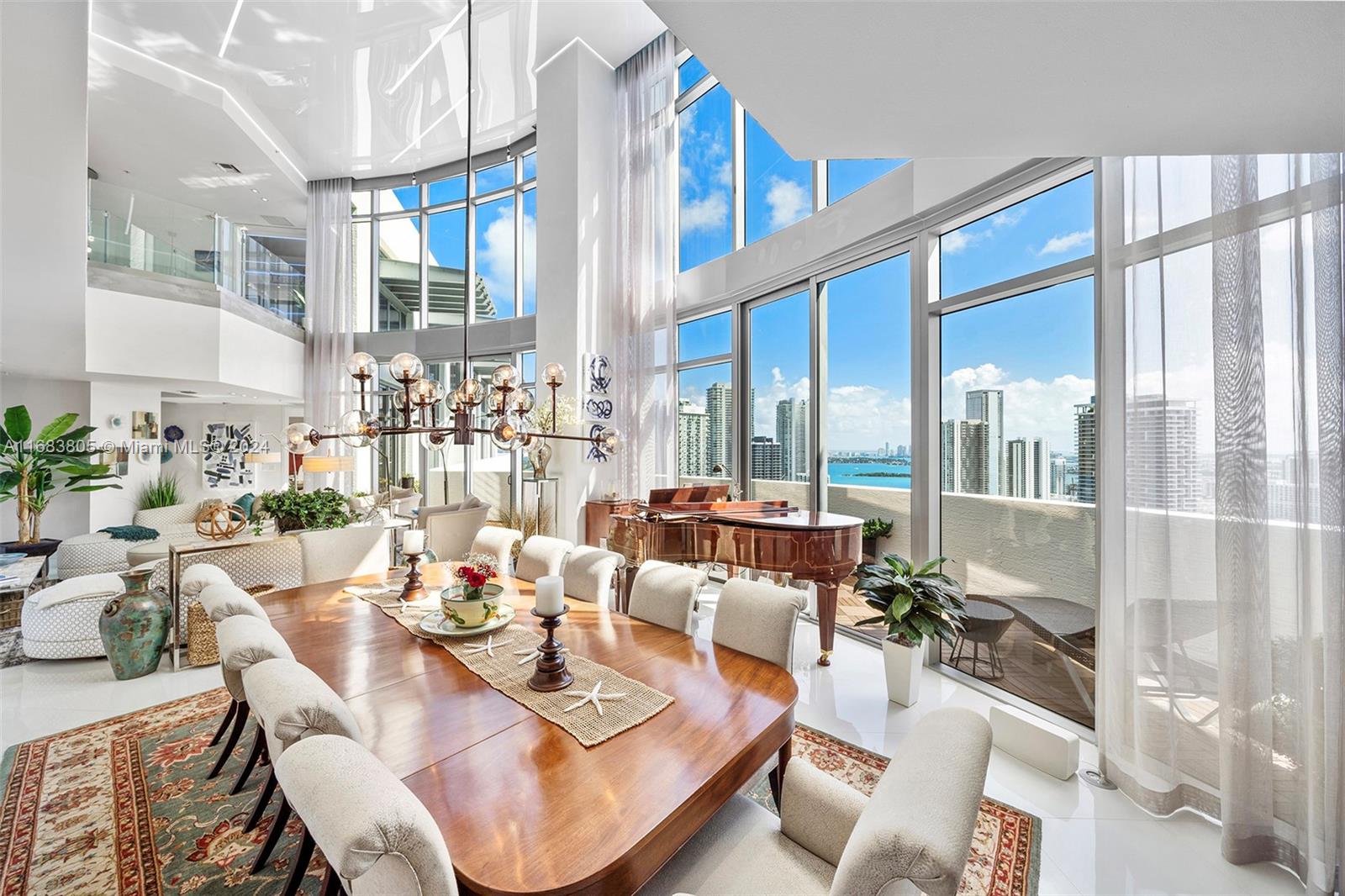 Come see the most beautiful views in Midtown Miami from this 3 Bed plus Den/3.5 Bath Penthouse with double height ceilings at 4Midtown.  Professionally designed to include sleek white floors, imported stones, and an upgraded kitchen.  Awash with natural light, the highlight is the direct ocean, bay, and sunset views from the entire Penthouse. 4 Midtown has resort-style amenities and a prime Midtown location adjacent to Miami’s best restaurants and shops in Midtown, Wynwood, Design District, and Edgewater.  Call Listing Agent