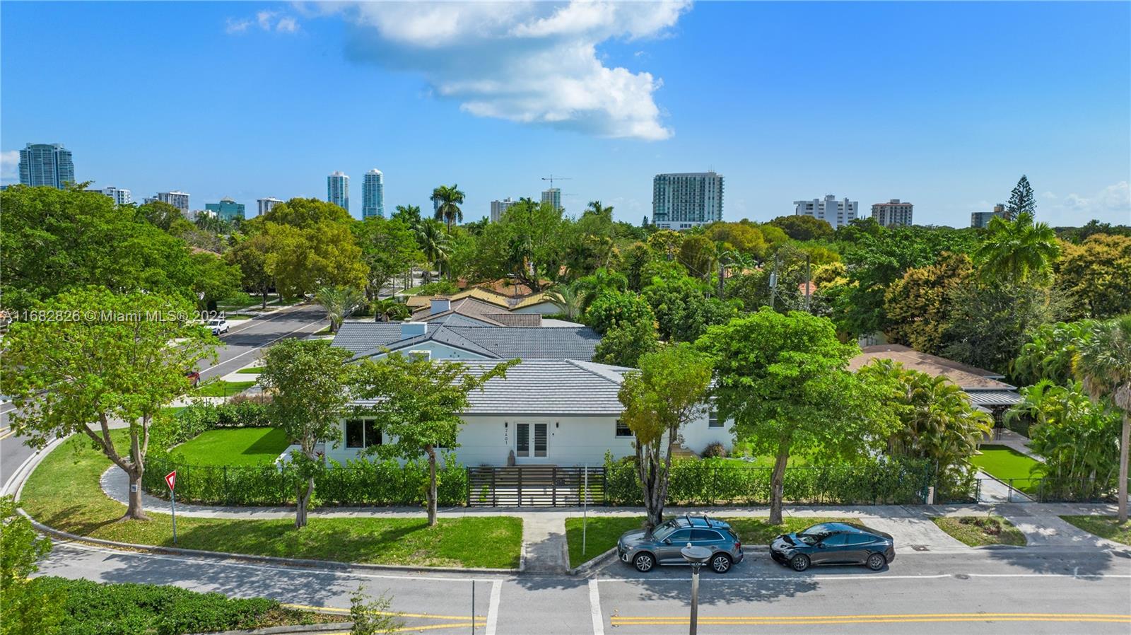 This stunning fully renovated residence sits on a prime corner lot and features a contemporary design with top-of-the-line amenities. The spacious home comprises 4 bedrooms & 4.5 bathrooms across a over 2,400 Sq.Ft. The property boasts an impressive list of new features, including plumbing, electrical, impact windows, A/C, and a new kitchen loaded with appliances thoughtfully considered to provide a premium living experience. Upon entering, you'll appreciate the modern interiors, open living spaces are perfect for entertaining guests or spending time with family, while the beautifully landscaped backyard with ample space for a pool offers endless possibilities for outdoor entertainment. This exceptional property delivers a luxurious lifestyle in the heart of Brickell Estates.