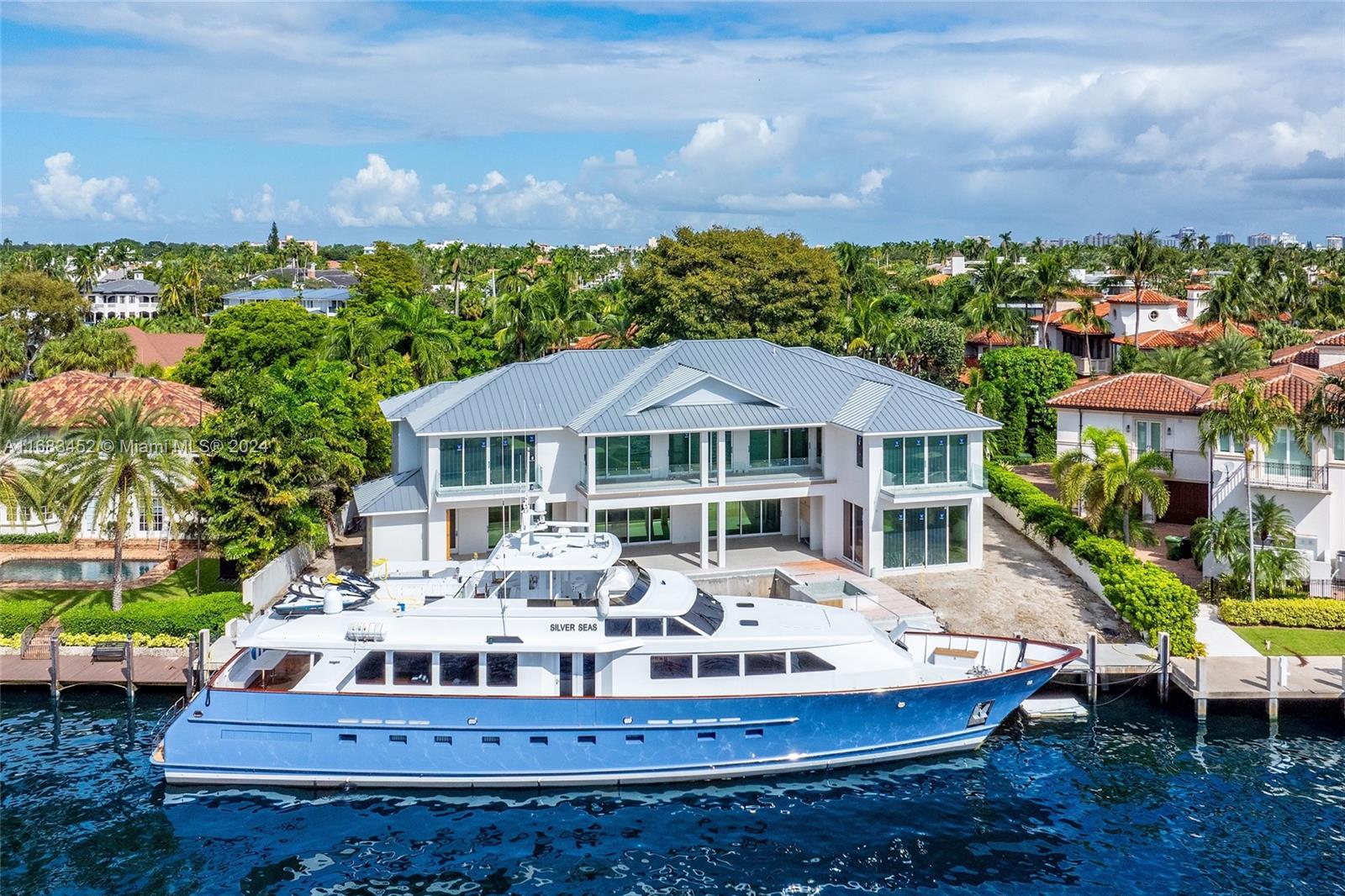 Experience unrivaled luxury and sophistication at this breathtaking waterfront residence. Featuring 130ft of awe-inspiring Intracoastal views, this newly built masterpiece offers a truly magnificent living experience. Boasting 7 bedrooms, 8.5 bathrooms, and an expansive 8,600 square feet of interior space. Simply put, this estate exudes opulence. Indulge in meticulously designed amenities, including an in-home office, gym, theater, and oversized club room with a stylish bar. With an expected completion date of December 2024, this architectural marvel will blend modernity with a classic Floridian appeal, bringing both convenience & comfort to new heights.