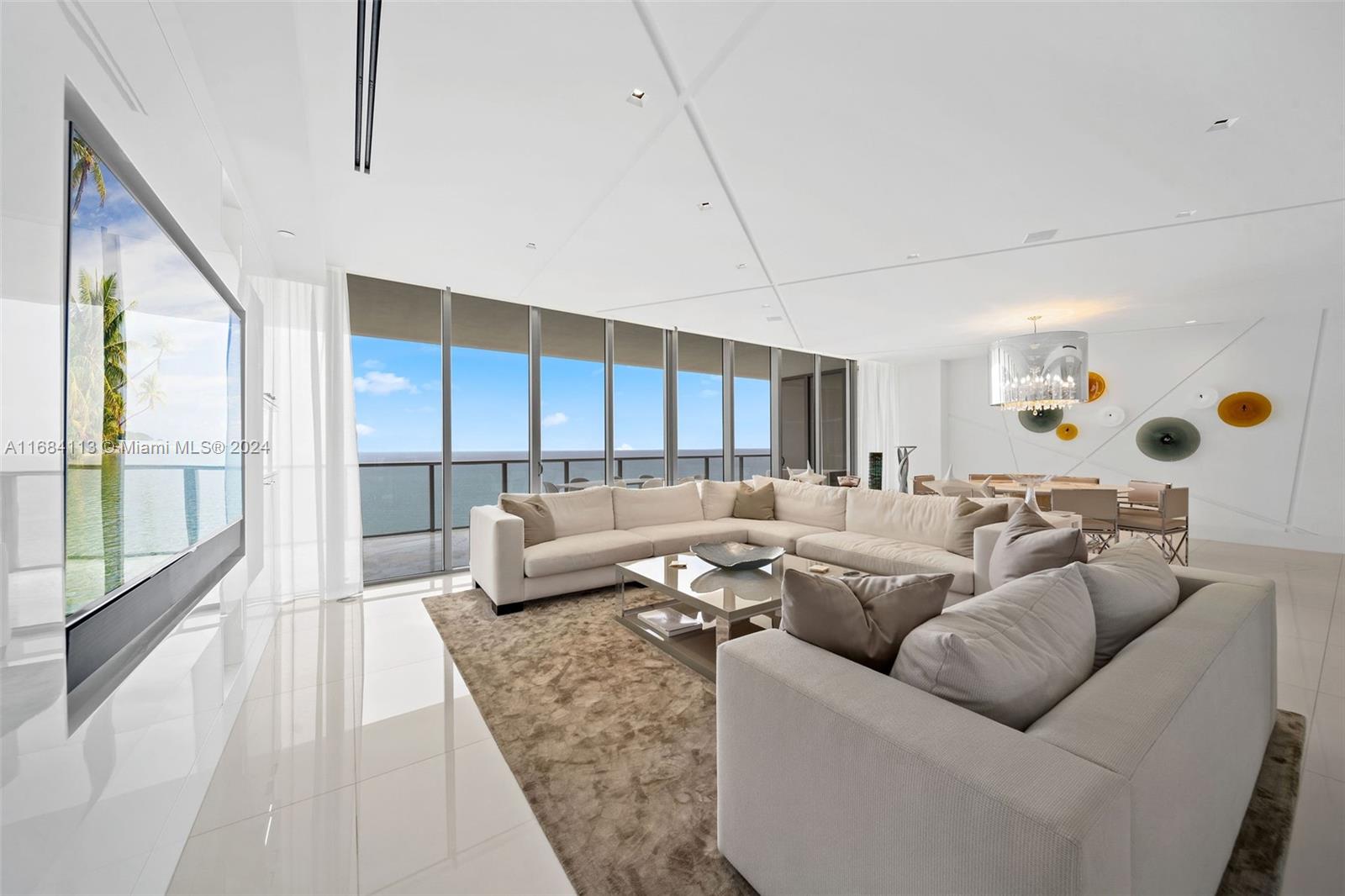 Unique turn-key unit at St. Regis Bal Harbour. True 4 bedroom and 4.5 bath unit, that is rarely available on the market. Designer furnished and decorated with numerous upgrades: automatic blinds and lights in all rooms, new kitchen (not original), many built-ins, surround system and many more. The unit is in great condition, because it was rarely occupied. As an option, this unit can be sold together with a connecting unit (via balcony and elevator corridor) on the same floor right next to it. Great setup for large family (please look at St Regis 2103S MLS #A11408656). Negotiable.