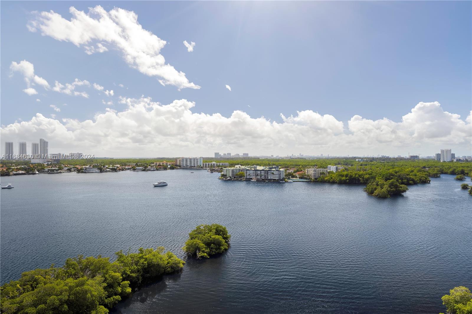 Discover serene water views and an ideal open floor plan in this meticulously updated 4-bedroom, 4-bathroom residence, designed for unparalleled luxury. Featuring Restoration Hardware furnishings, Subzero and Wolf appliances, quartz countertops, Control4 smart home system, exquisite flooring, built-in closets, and an oversized terrace overlooking a natural preserve. The Reserve at Marina Palms offers exclusive amenities, including a lavish spa, state-of-the-art fitness center, yoga/Pilates studio, business lounge, resort-style pool with summer kitchen, dog trail, children’s pool, and Play Zone.