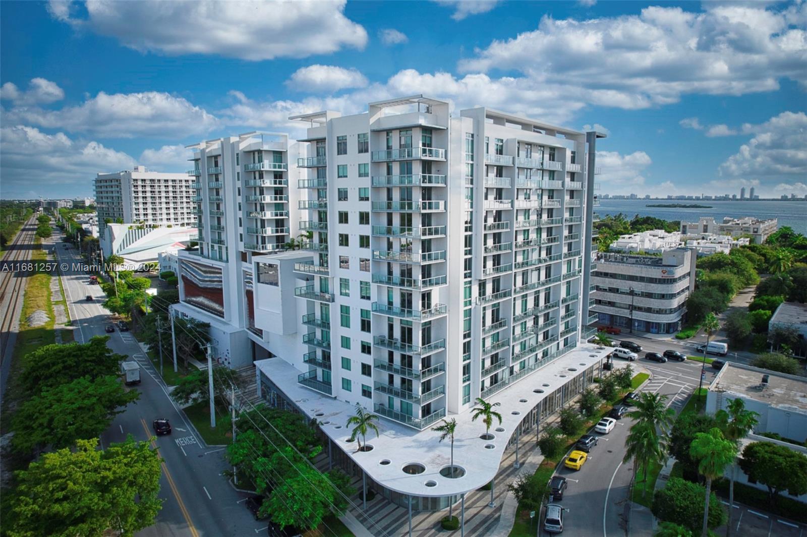 Experience luxury living at its finest in this elegantly furnished 2-bedroom, 2-bathroom condo at Quadro Miami. Boasting sweeping panoramic views, this residence offers an unparalleled lifestyle with resort-style amenities, including a stunning pool area overlooking the bay, a state-of-the-art fitness center, barbecue area, business lounge, bike storage, electric car charging stations, and 24/7 front desk service. Inside, enjoy the convenience of an in-unit washer and dryer, all designed for effortless living. Ideally located just 15 minutes from Miami International Airport and the pristine beaches, this condo places you steps away from the vibrant energy of the Design District, making it the perfect blend of comfort, style, and convenience. All information must be verified by the buyer.