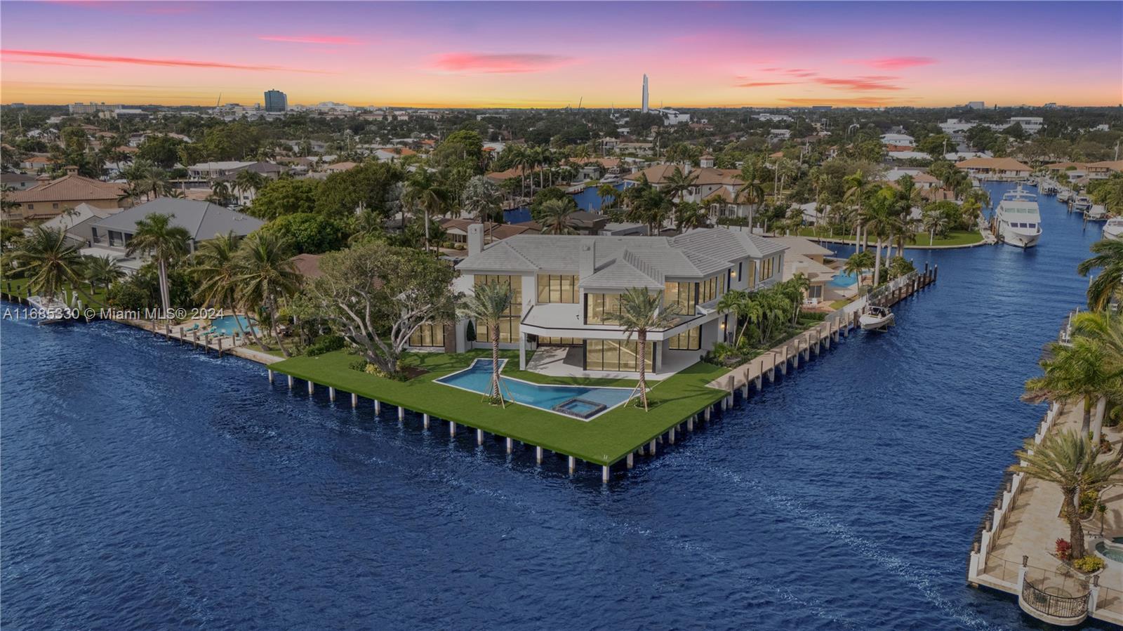 Indulge in unparalleled waterfront luxury at this 11,000+ sq ft newly built estate on an expansive deep water Intracoastal Point Lot, designed to captivate with sweeping water views and private new dockage/seawall for a yacht. Perfect for boating enthusiasts, this residence offers meticulously crafted outdoor spaces ideal for relaxation and entertainment. Inside, high-end finishes and custom touches will define sophistication, with an open floor plan that maximizes light and views. A gourmet kitchen with Sub-Zero & Wolf appliances and a lavish main suite featuring a quarzo slab shower create a sanctuary of elegance and prestige. Located in The Landings, a tranquil neighborhood, near top schools, this property epitomizes a refined waterfront lifestyle with unmatched convenience and privacy.