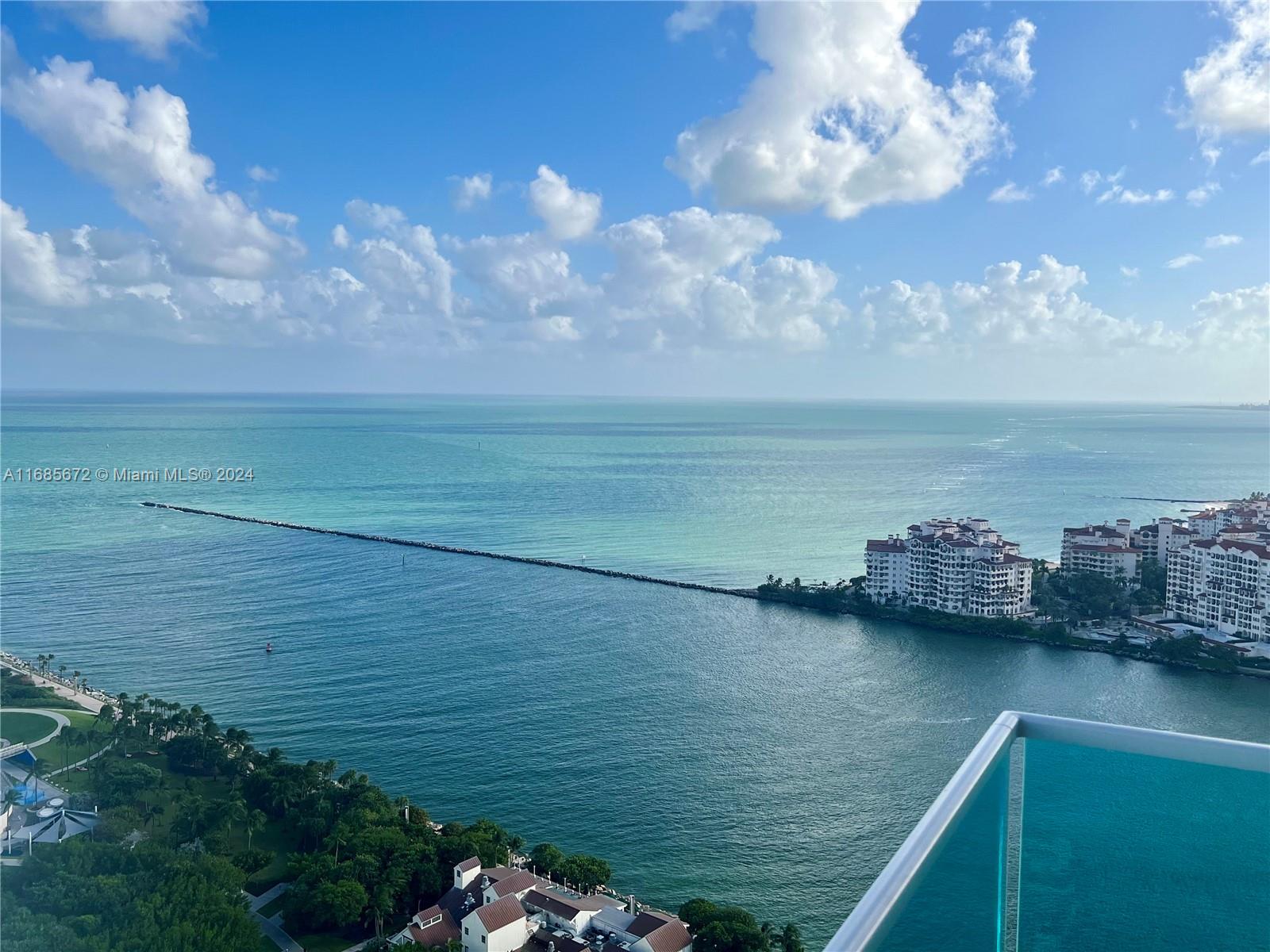 Rarely available incredible high floor residence at the prestigious Portofino Tower. Breathtaking 270 degree panoramic views of the Atlantic ocean, Fisher Island, Miami Beach, Biscayne Bay, Miami skyline and both sunrises & sunsets every day & night. Stunning floor-to-ceiling windows throughout & two large terraces. Large eat-in kitchen with ocean views & direct terrace access. Stunning master suite with two walk-in closets, 2 bathrooms & jacuzzi tub with sunset views overlooking the Bay & skyline. Live in one of South Beach's most iconic buildings in the exclusive South of Fifth neighborhood. Full service building features a gym/spa-in-the-sky, 24 hour valet & security, concierge, swimming pool, and much more! Short stroll to the beach, high-end restaurants, lush parks, marina & nightlife