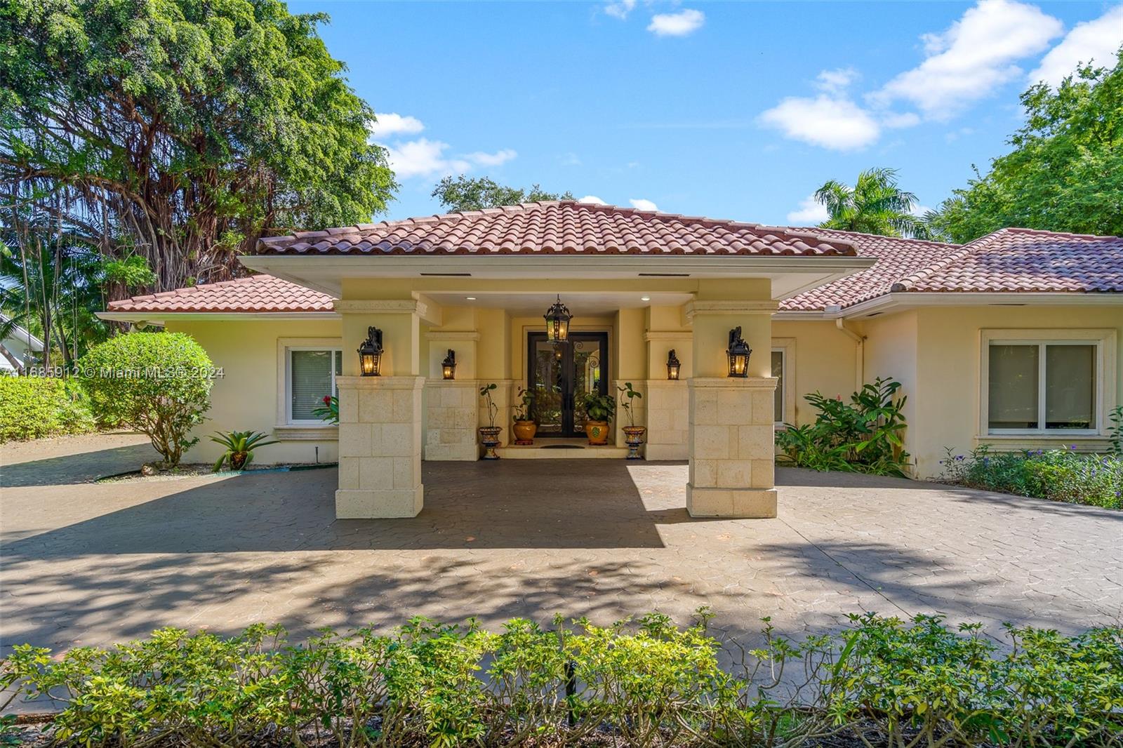 Welcome home to Casa Grande! This expansive single story gorgeous North Pinecrest gated acre estate in located on a quiet tree lined street. The home boasts an elegant and well maintained 6 bedroom and 6 bath residence plus an additional 1 bedroom and 1 bath plus kitchen guesthouse. Grand double door foyer entry to formal living room. Expansive eat in chefs kitchen, ample family room with inviting bar. Stunning pool and waterfall with plenty of open and covered patios for family entertaining. High ceilings, marble floors, fireplace and impact windows and doors. Two car garage, lushly landscaped and secluded with 38,768 lot size. Seller Motivated! Bring your best offer today. Will not last.