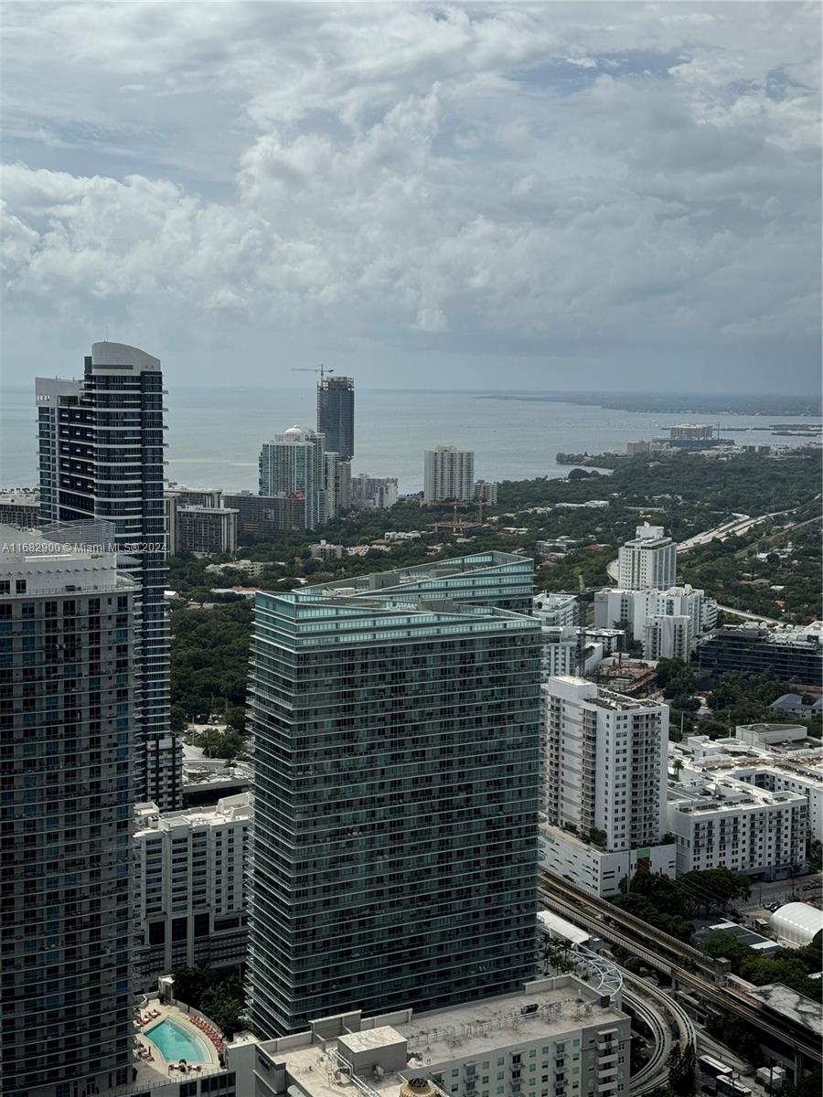 Live in the amazing  High floor SLS LUX unit facing SE in the heart of Brickell!.Best unobstructed view in the building This unit features 1 bed, 2 full bath + Den with Italian ceramic flooring ,High end kitchen appliances and private elevator to the unit. Amenities include a rooftop pool & jacuzzi, a second pool deck with a full bar, cabanas, tennis/basketball courts, fitness center and spa, valet service for your car, and 24 hr concierge/security. Steps away from Brickell City Center, all the great restaurants and entertainment.Free one car parking through valet.